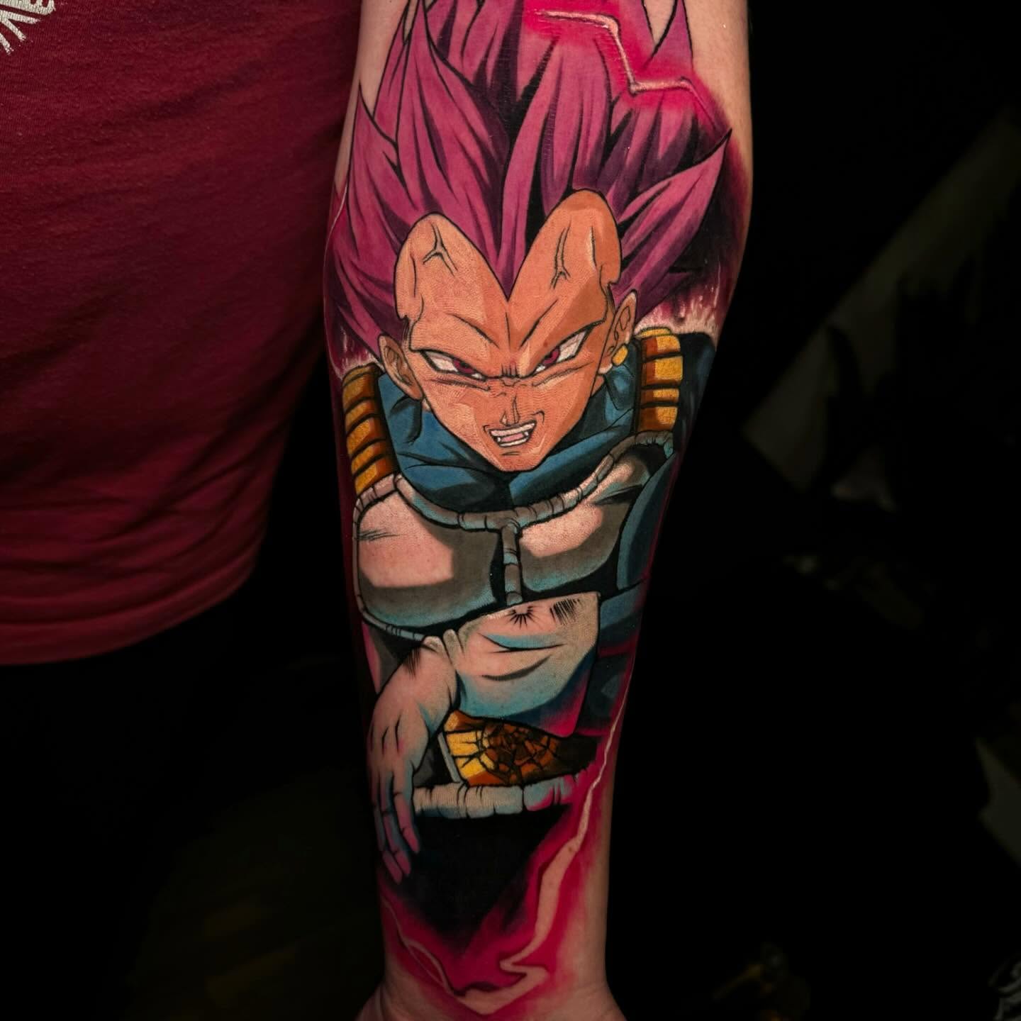 Super saiyan god ssj goku anime tattoo on the forearm by Gabriel Varelas, Phoenix, Arizona