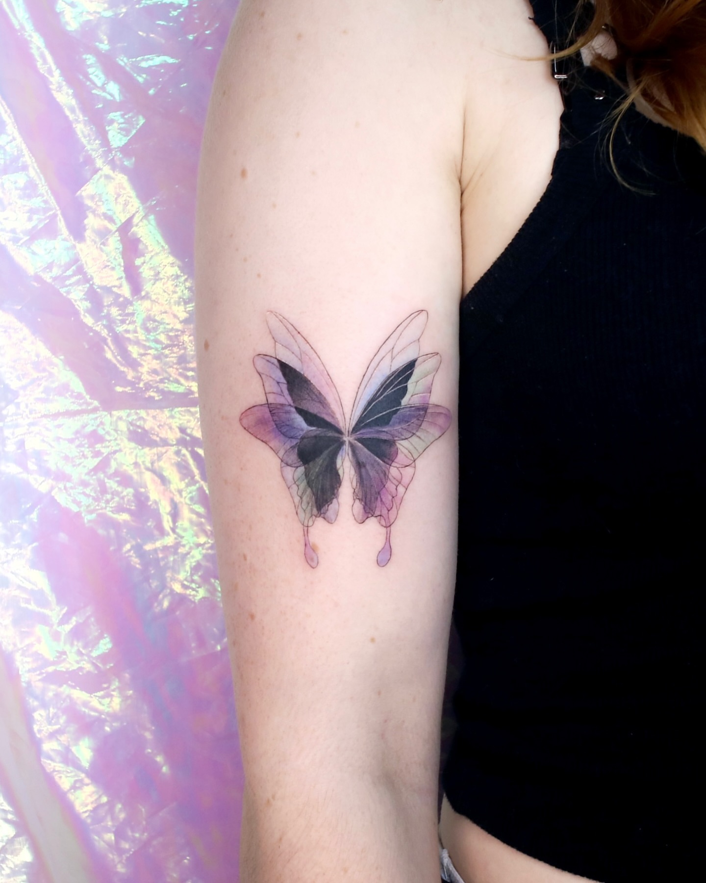 Butterfly watercolor tattoo on the forearm by 밍꽈 타투