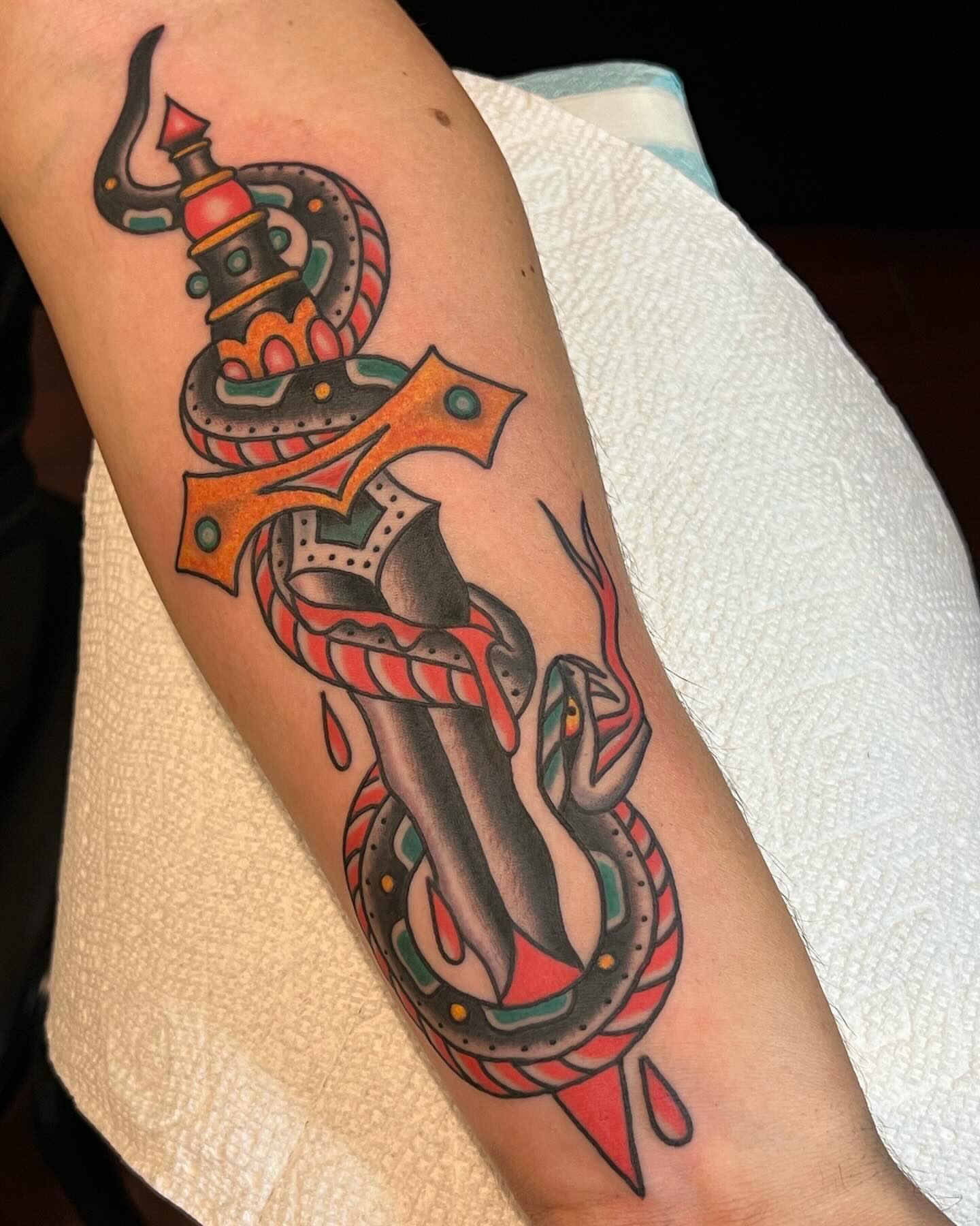 Anchor and snake American traditional tattoo on the forearm by Ross K. Jones Tattoos, San Francisco, California