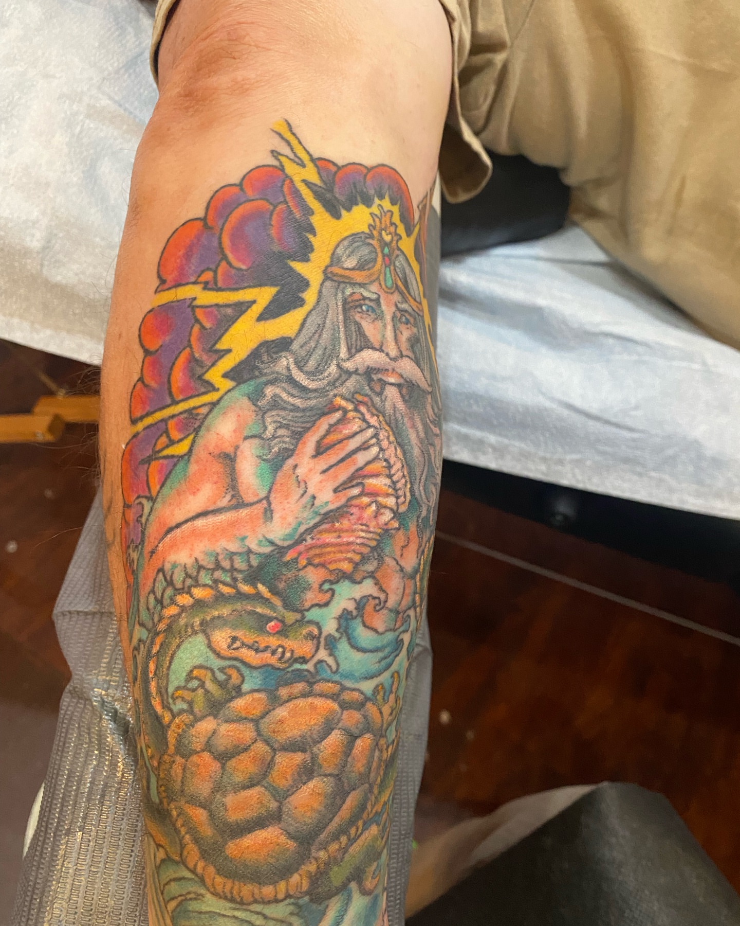 Merman with beard American traditional tattoo on the forearm by Christopher Sanders