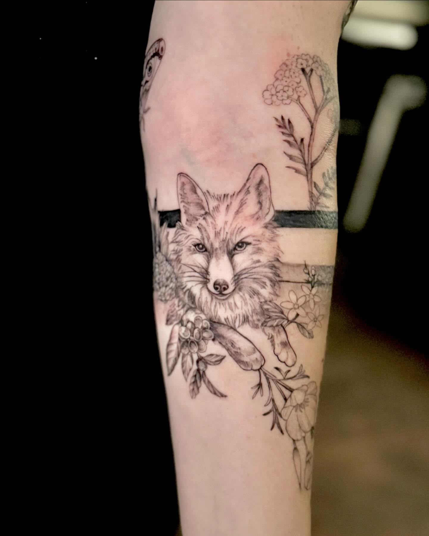 Fox and floral realism tattoo on the forearm by đź’›Kristinađź’› tattoos with intention, Minneapolis, Minnesota
