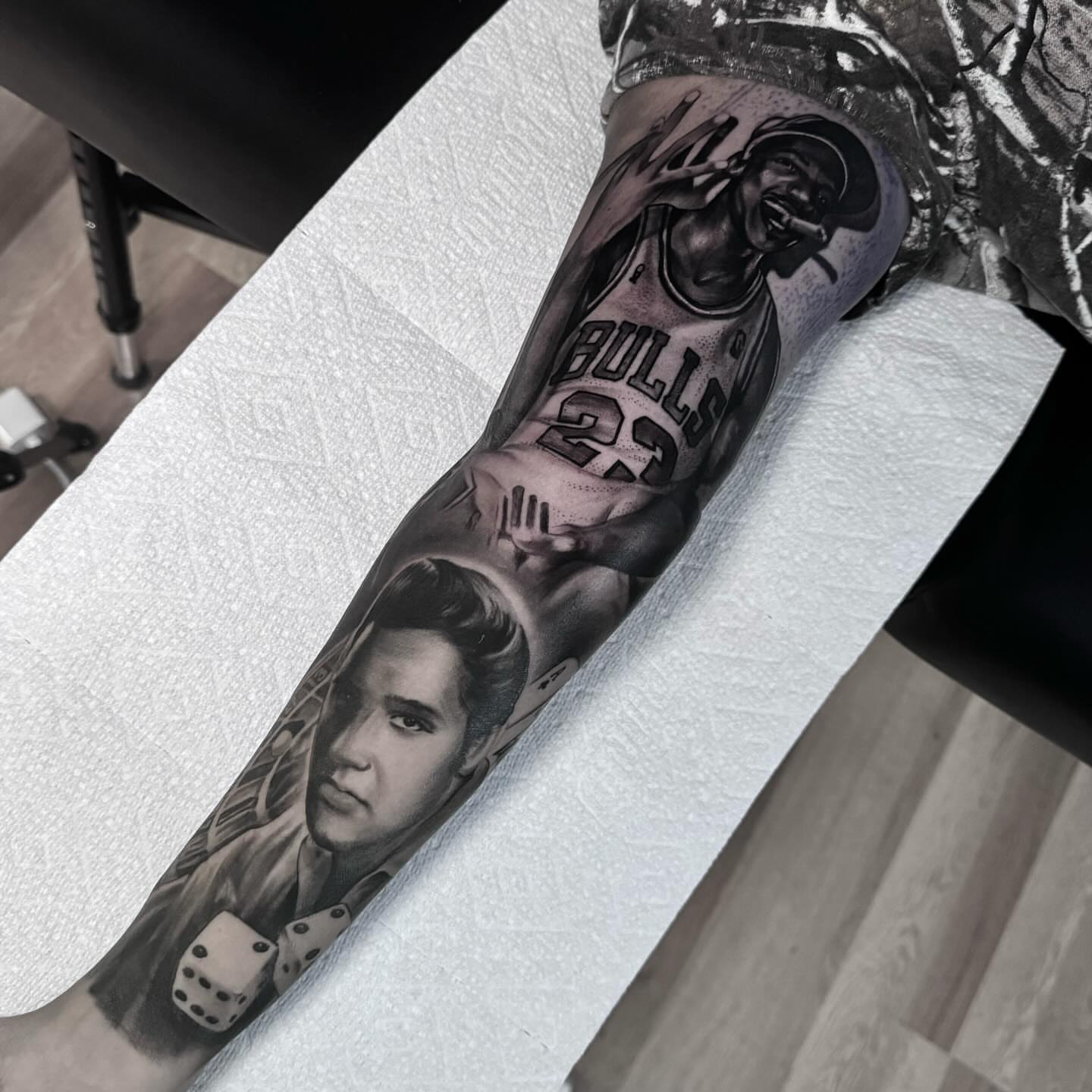 Elvis presley and michael jordan realism tattoo on the forearm by Jake Fujimura