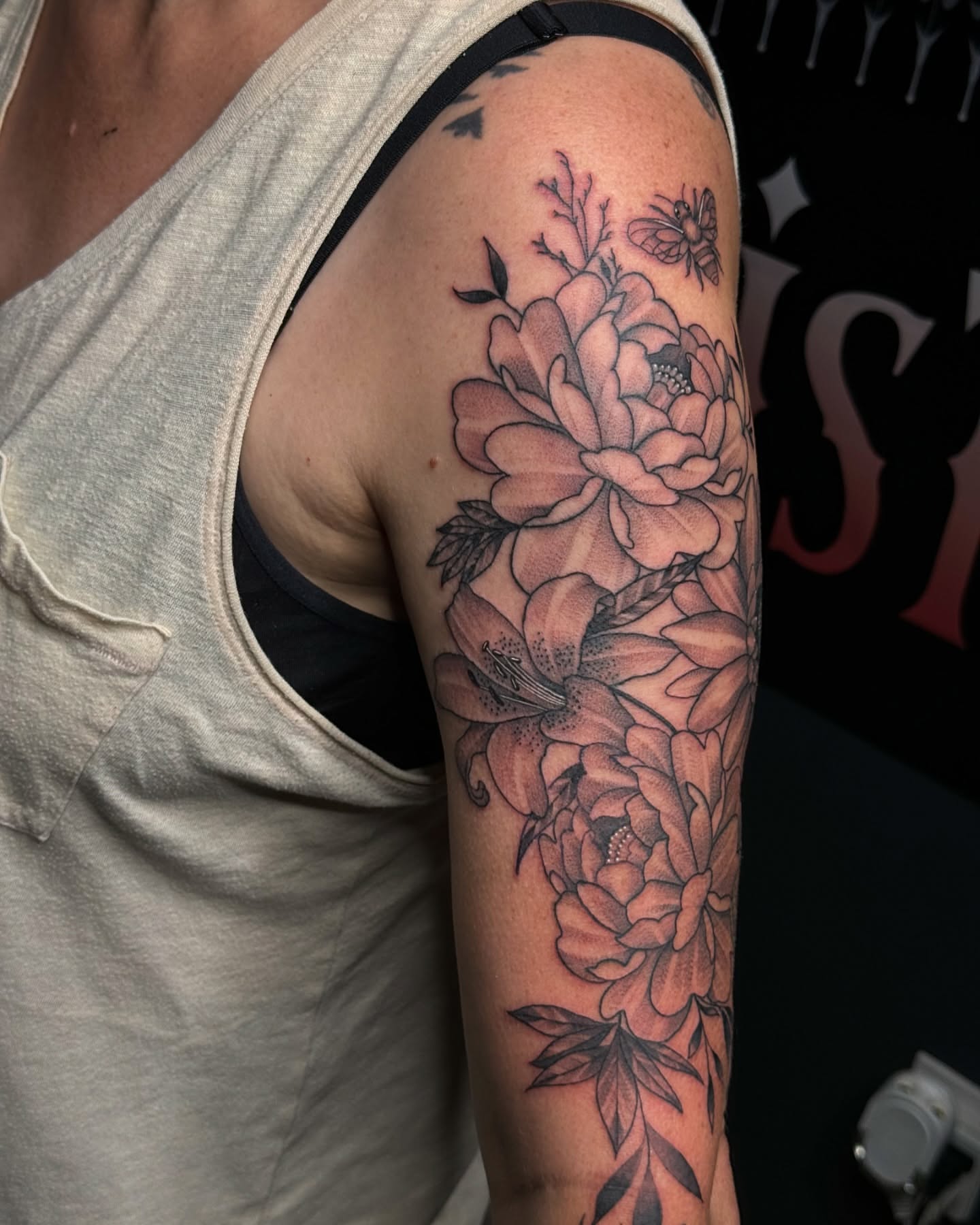Floral bouquet black and grey tattoo on the forearm by Chris_Tatt2_D’Ascenzo