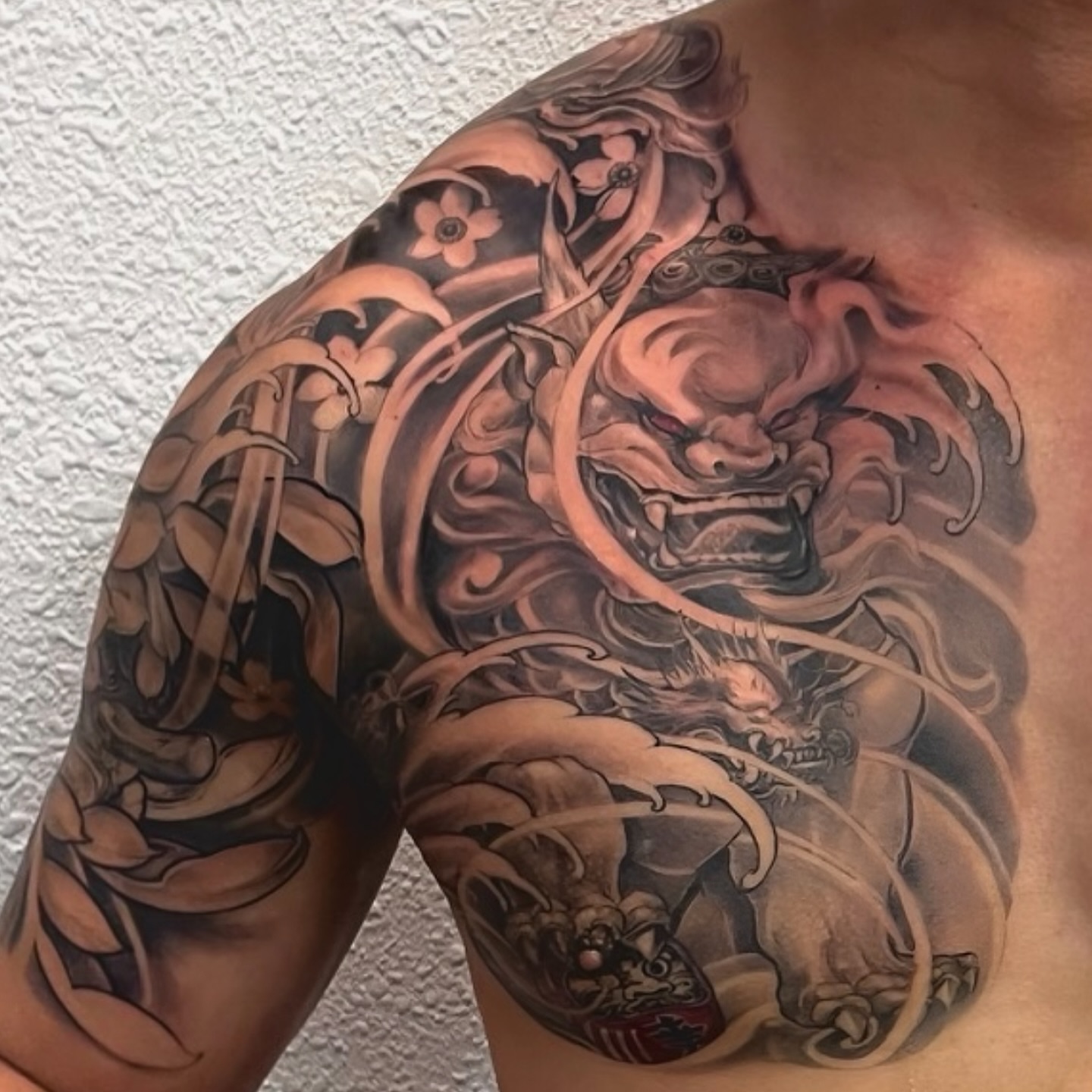Lion and dragon japanese irezumi tattoo on the chest by Rocky Nguyen DFW Dallas Japanese