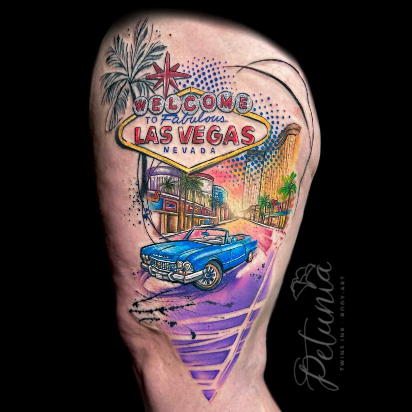 Las vegas sign watercolor tattoo on the forearm by Alena Petunia