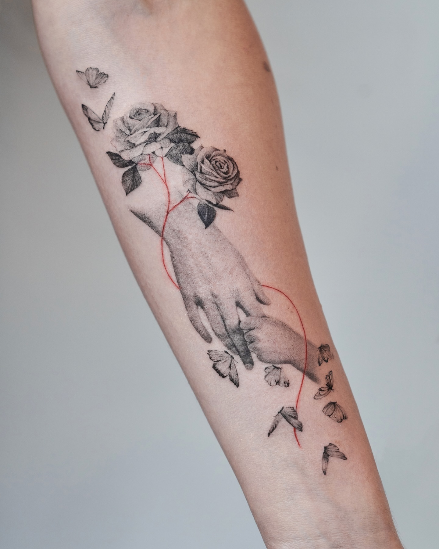 Hands and roses realism tattoo on the forearm by Tattoo artist LA ། Fine line, Micro realism