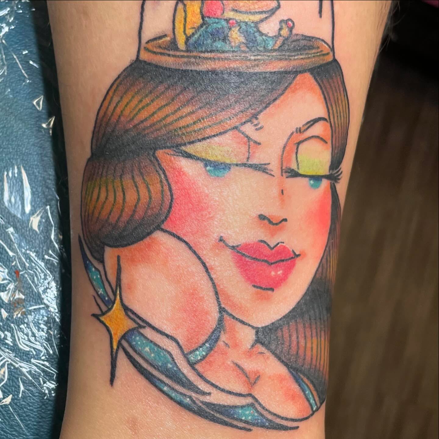 Woman with hat American traditional tattoo on the forearm by Evan