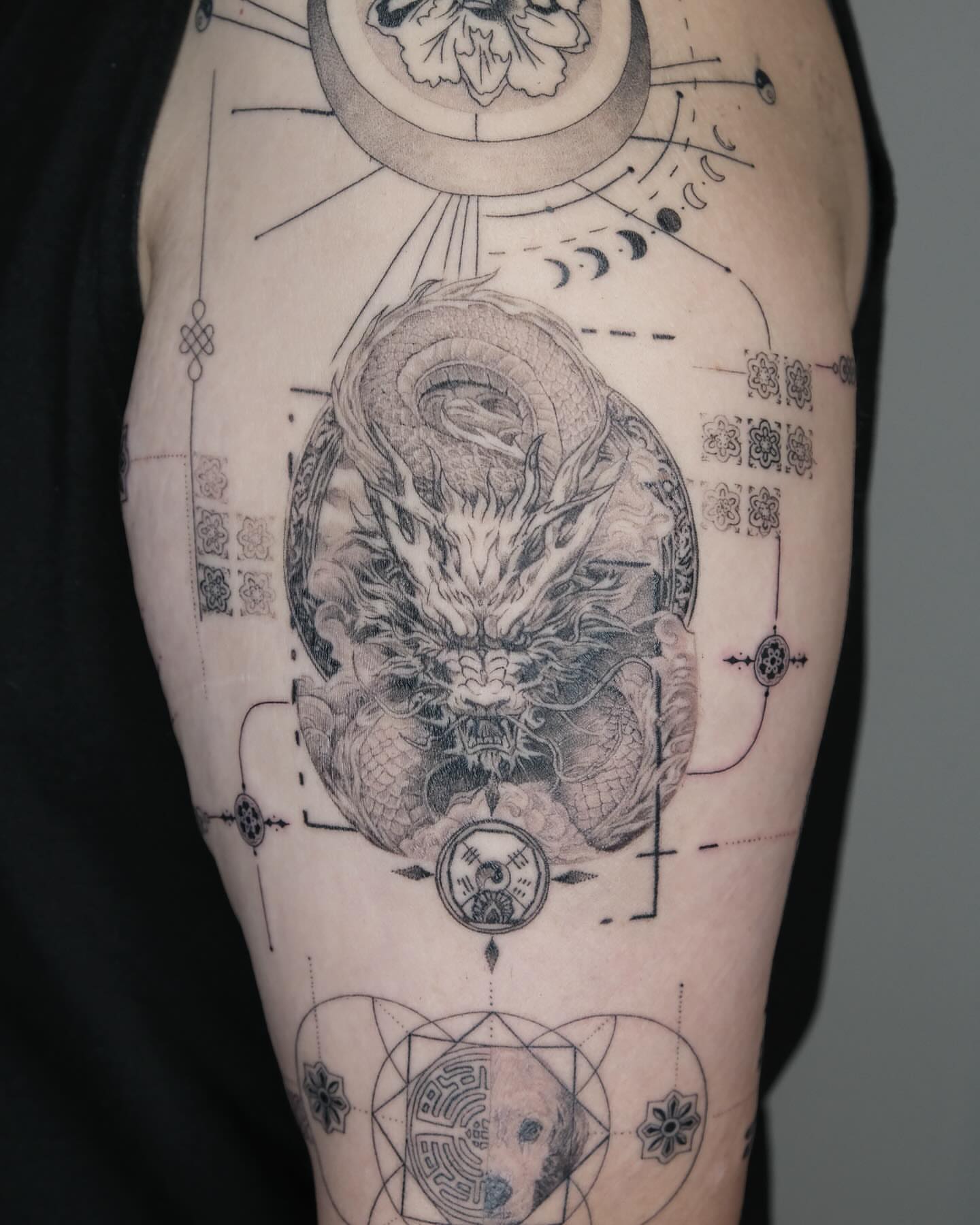 Dragon geometric tattoo on the forearm by Zay - Realistic tattoo Artist