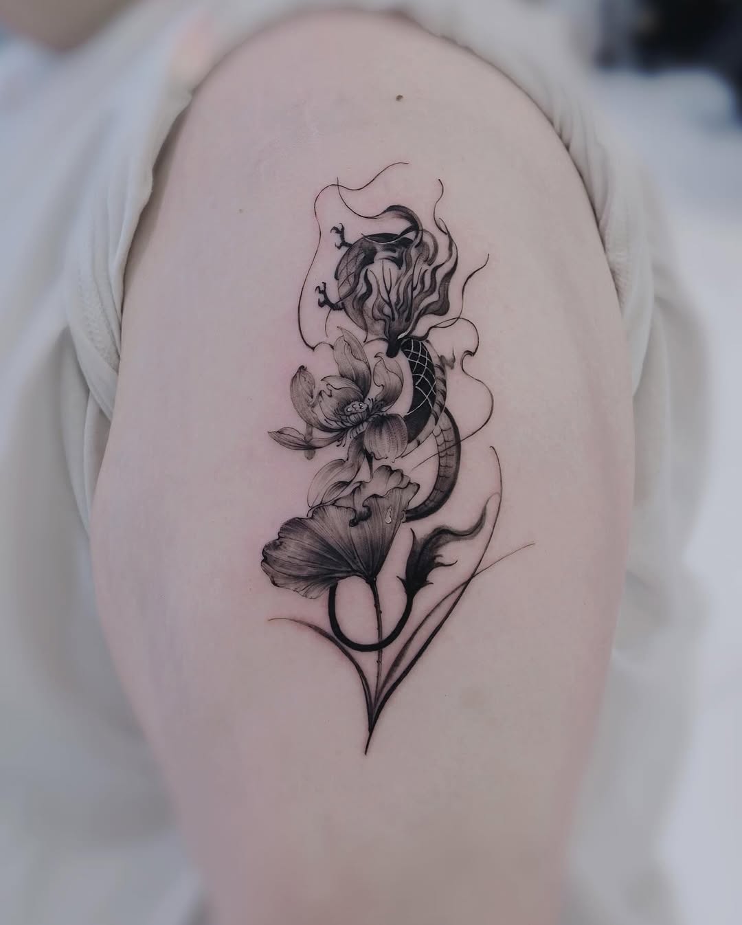 Tattoo by @mj_inkflow — black_and_grey, fine_line