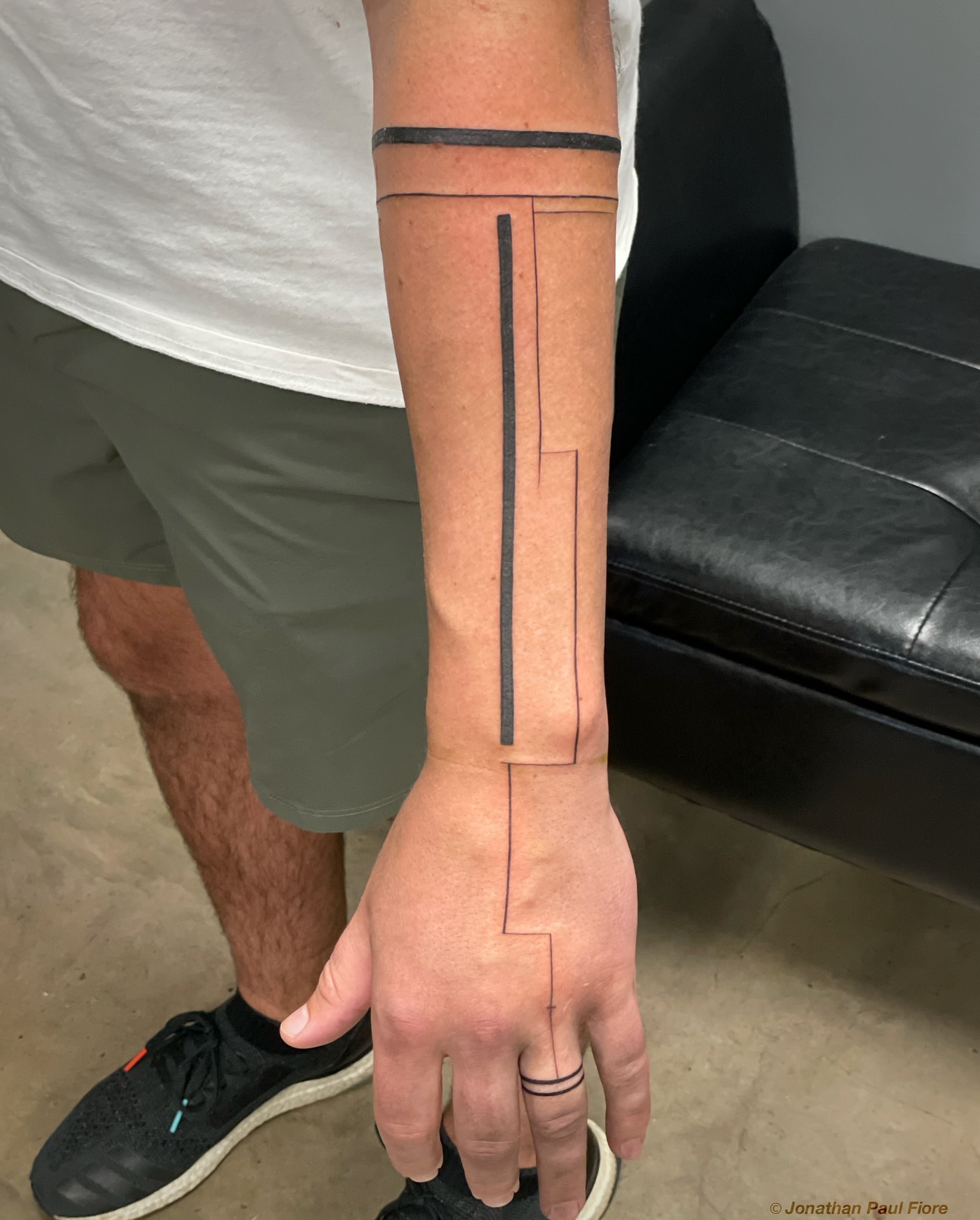 Geometric lines geometric tattoo on the forearm by Jonathan Paul Fiore, Austin, Texas