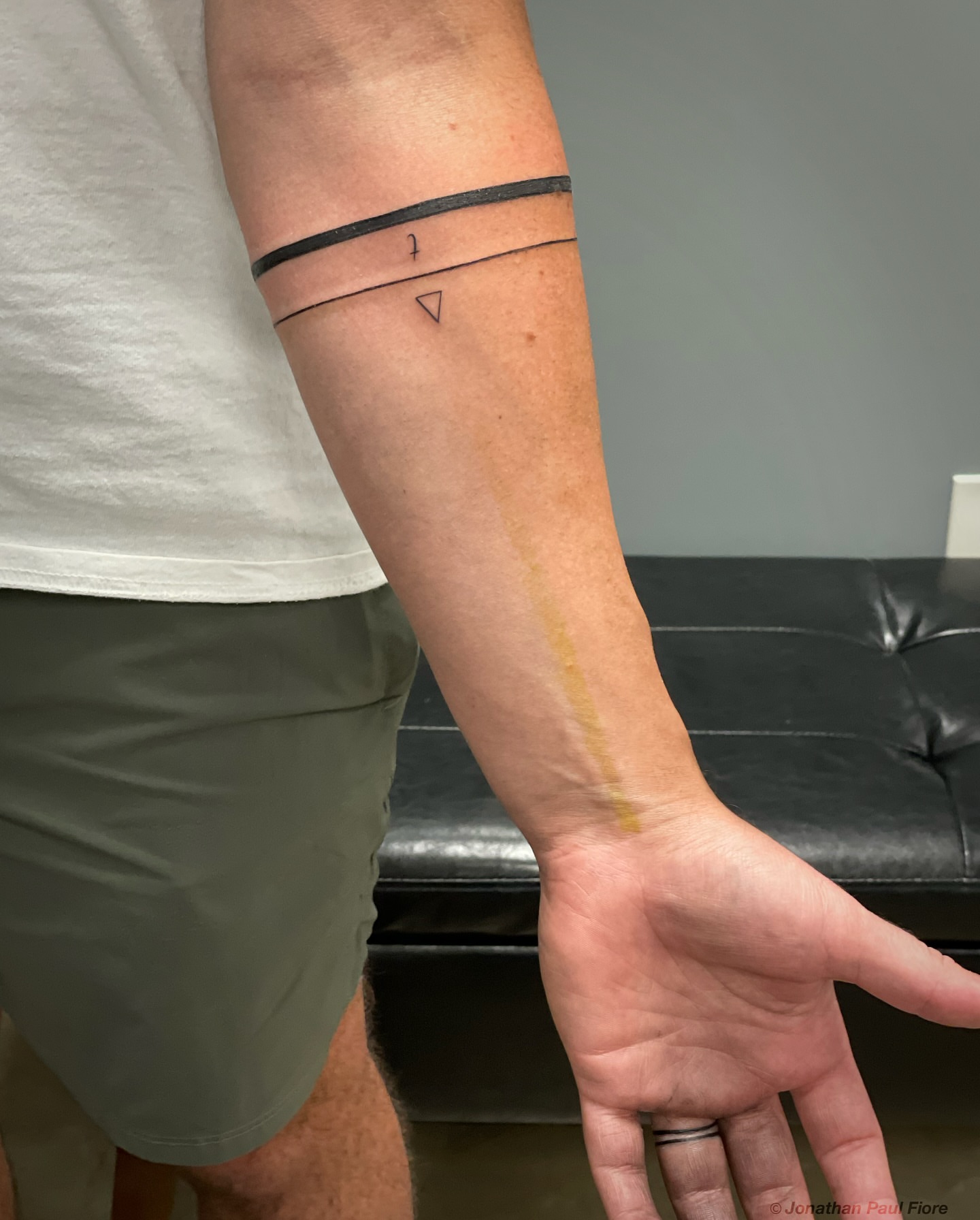 Geometric design fine line tattoo on the forearm by Jonathan Paul Fiore, Austin, Texas