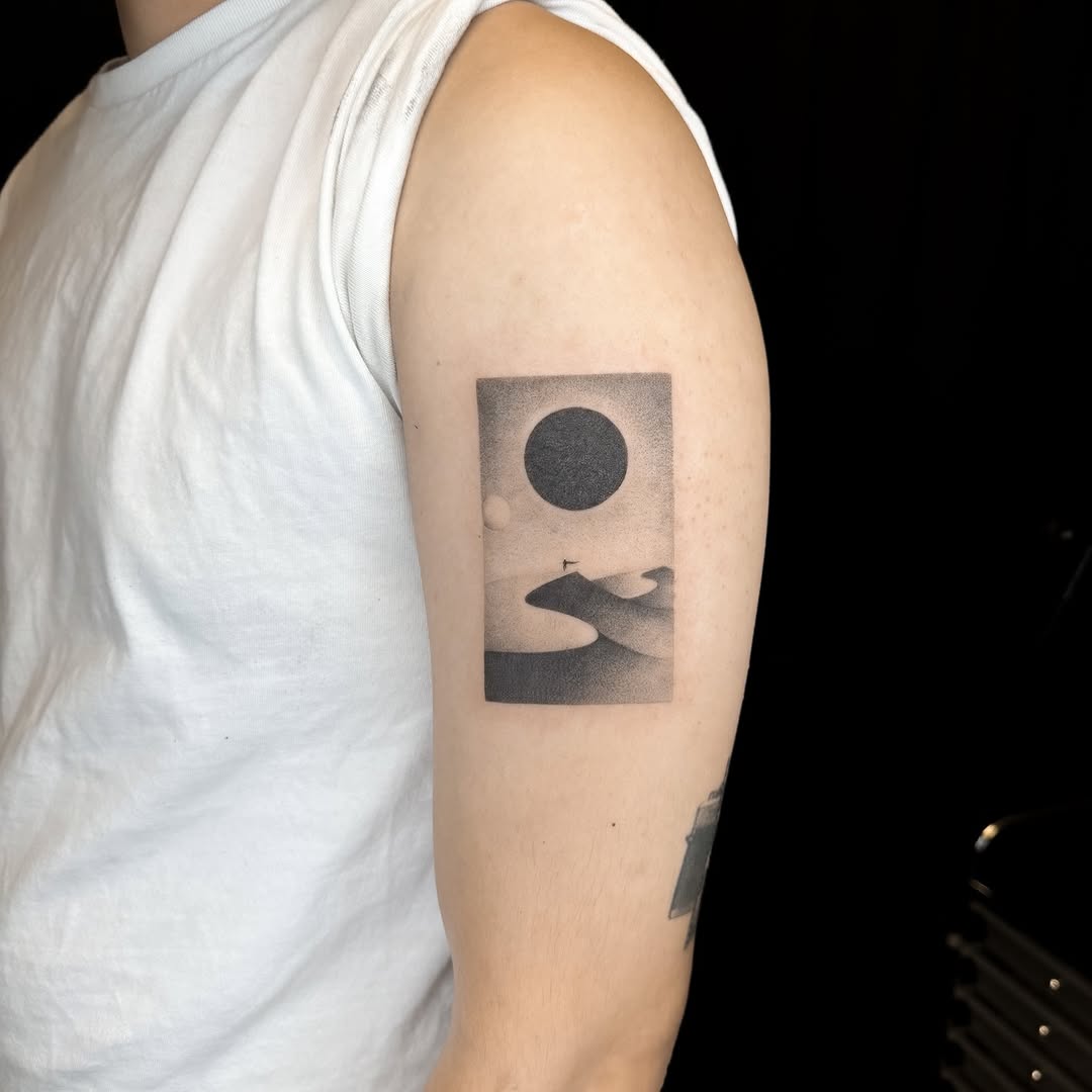 Desert landscape with sun and moon dark art tattoo on the forearm by INK by CEE