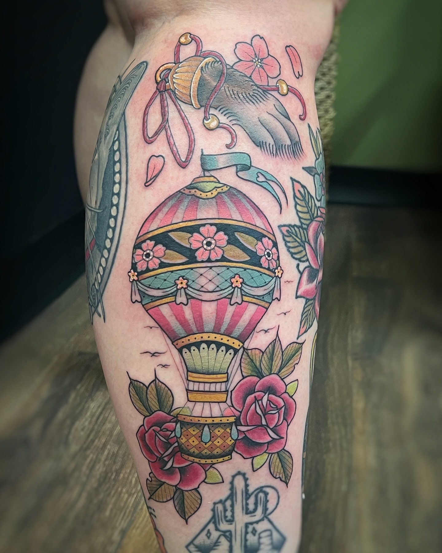 Hot air balloon American traditional tattoo on the calf by sam cedar geller 🐝