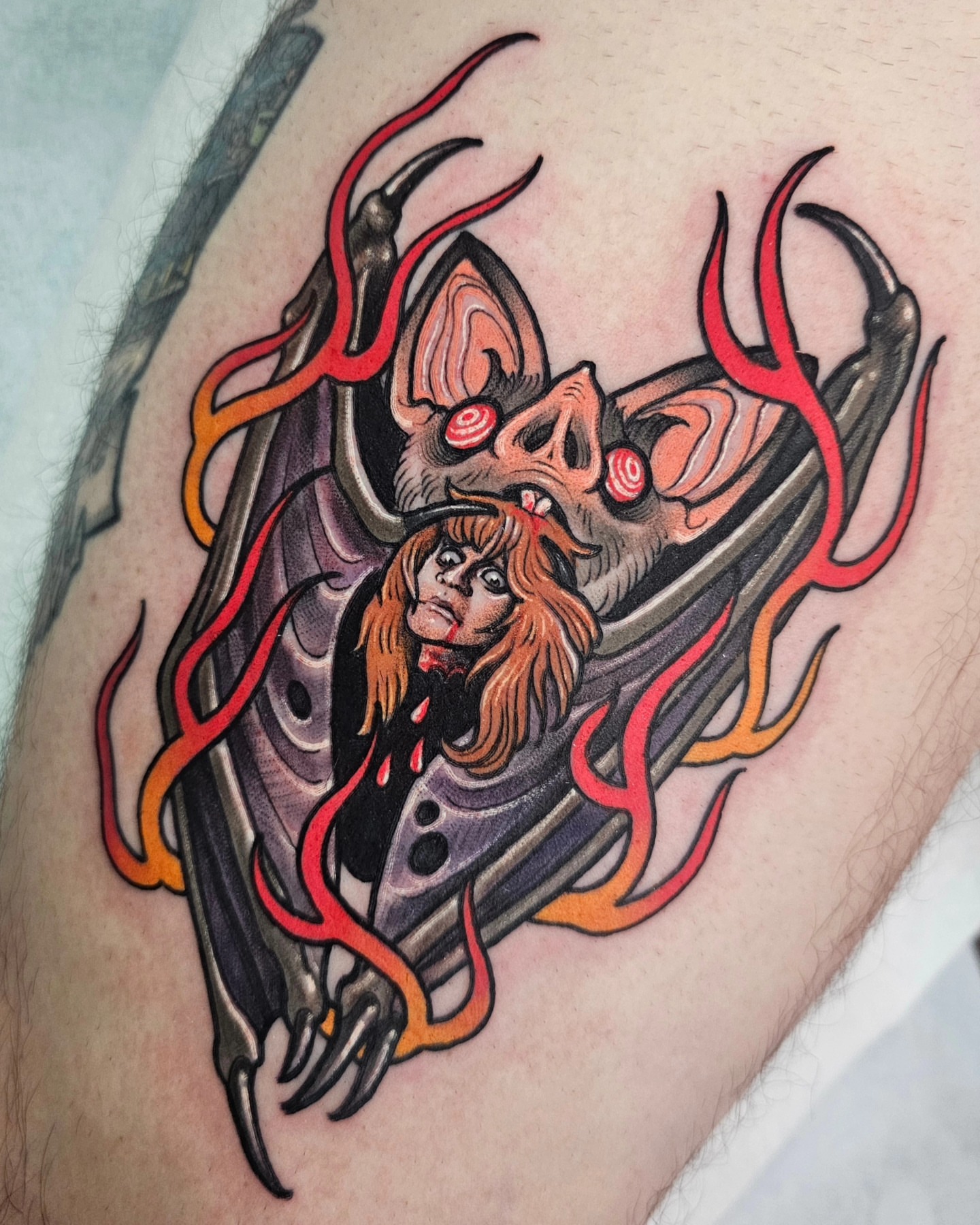 Demon and woman dark realism tattoo on the thigh by Shannon