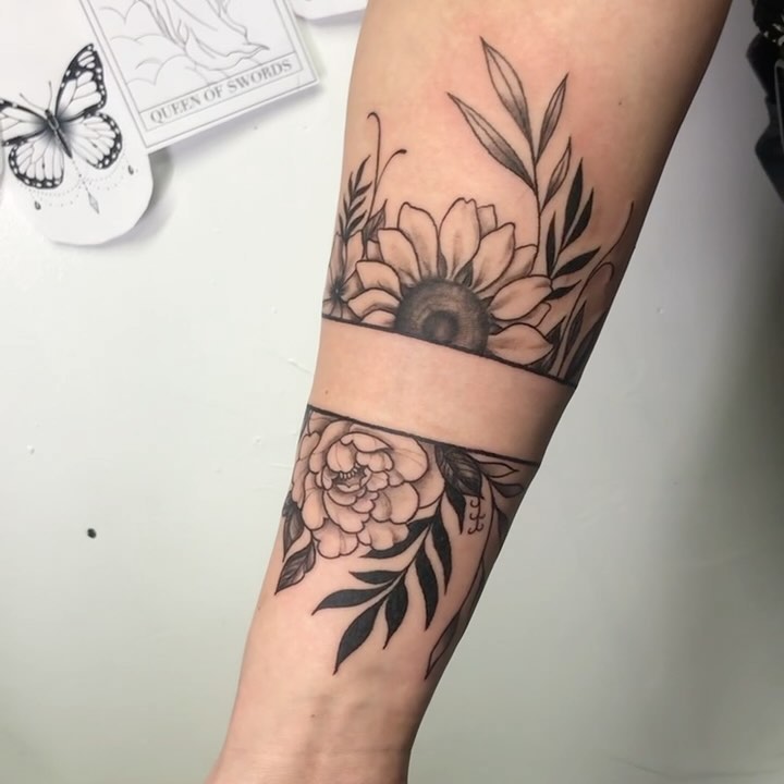 Sunflower and peony black and grey tattoo on the forearm by Detroit Tattoo Artist