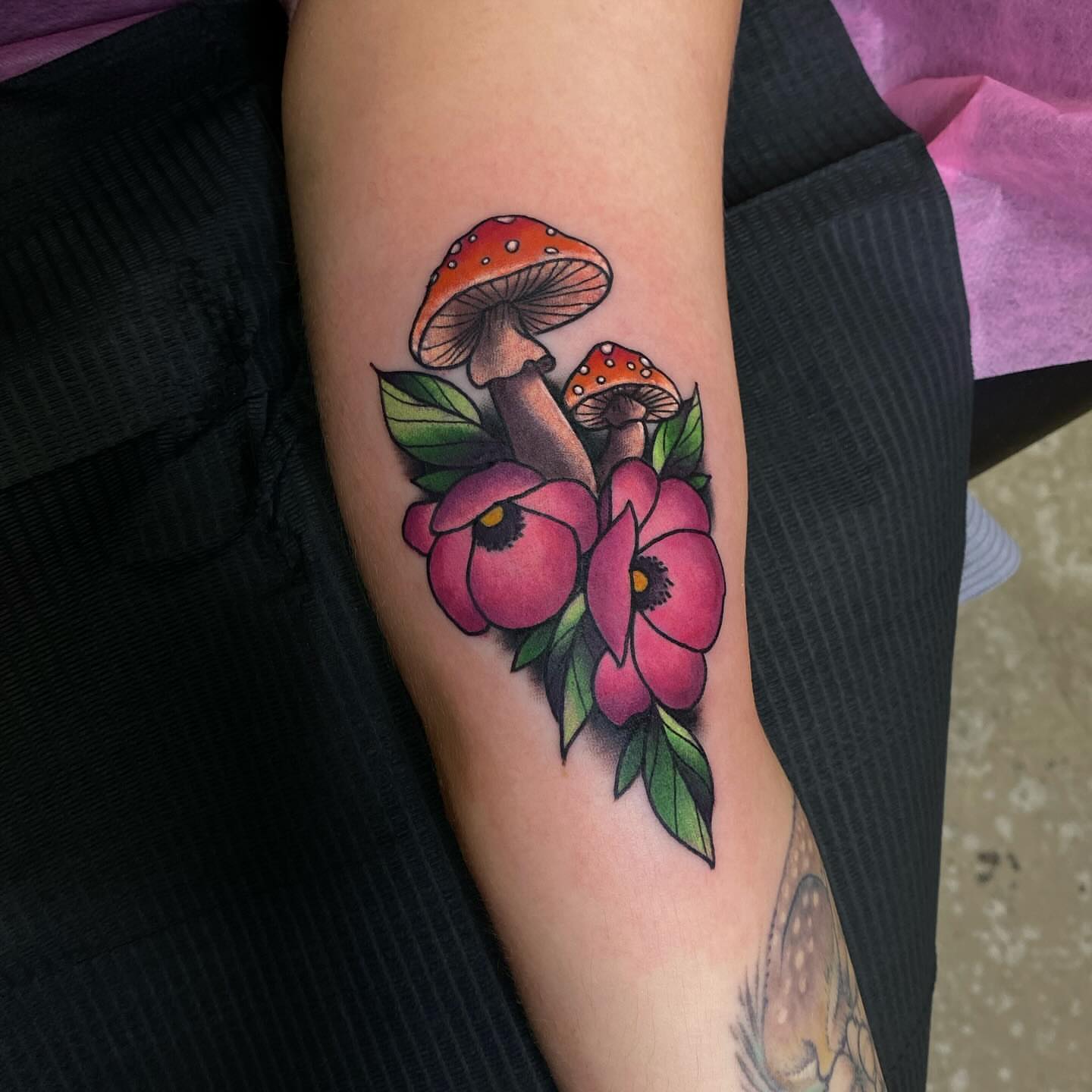 Mushrooms and flowers dotwork tattoo on the forearm by @kaitlin.tattoos, Richmond, Virginia
