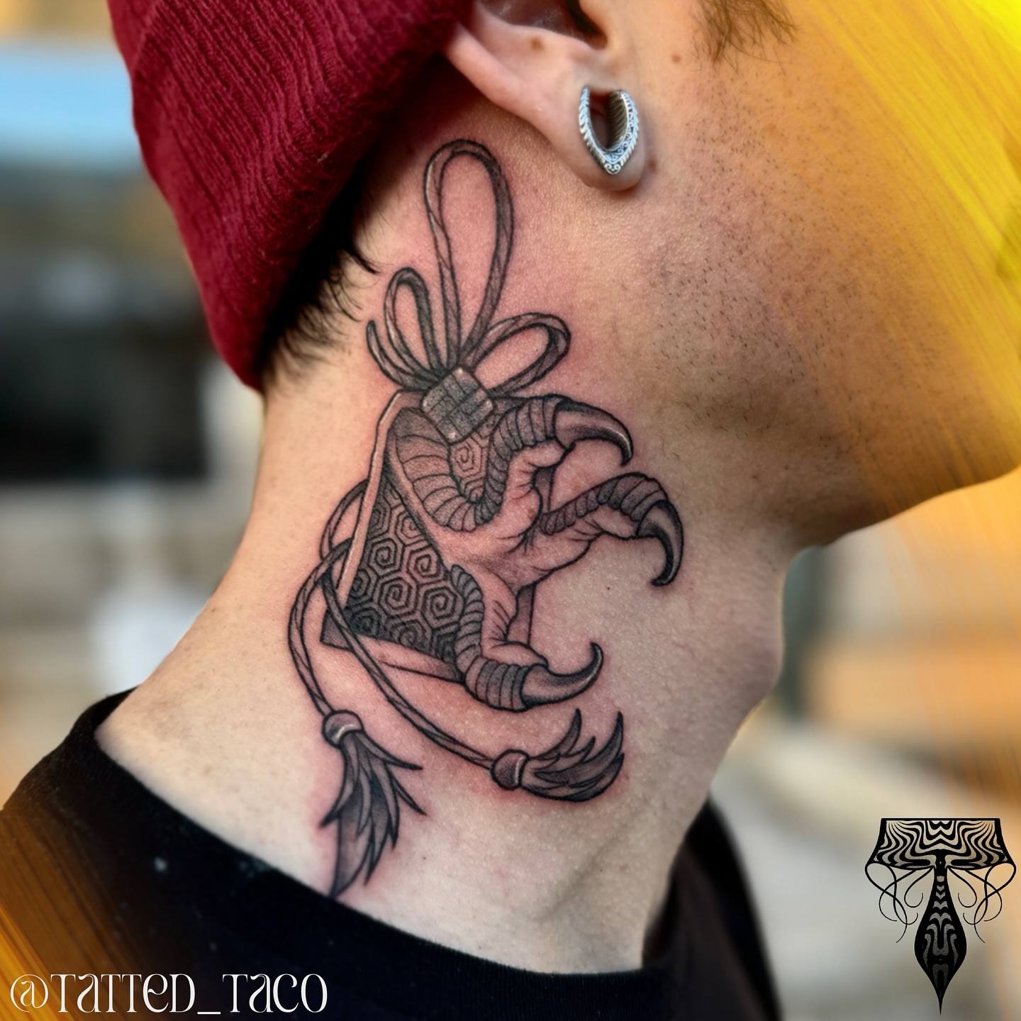 Heart with horns geometric tattoo on the neck by Ray Arce๐