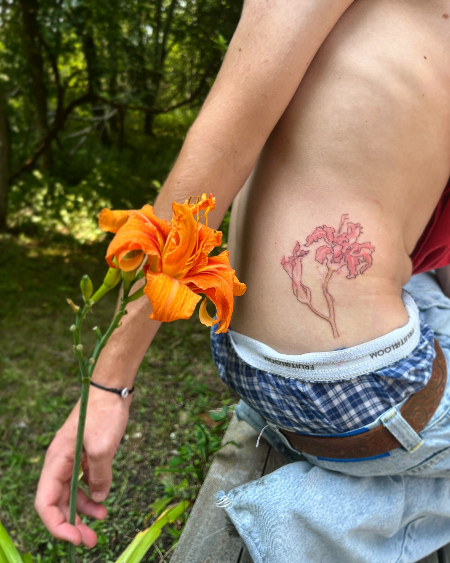 Lilies dotwork tattoo on the ribs by 잡초