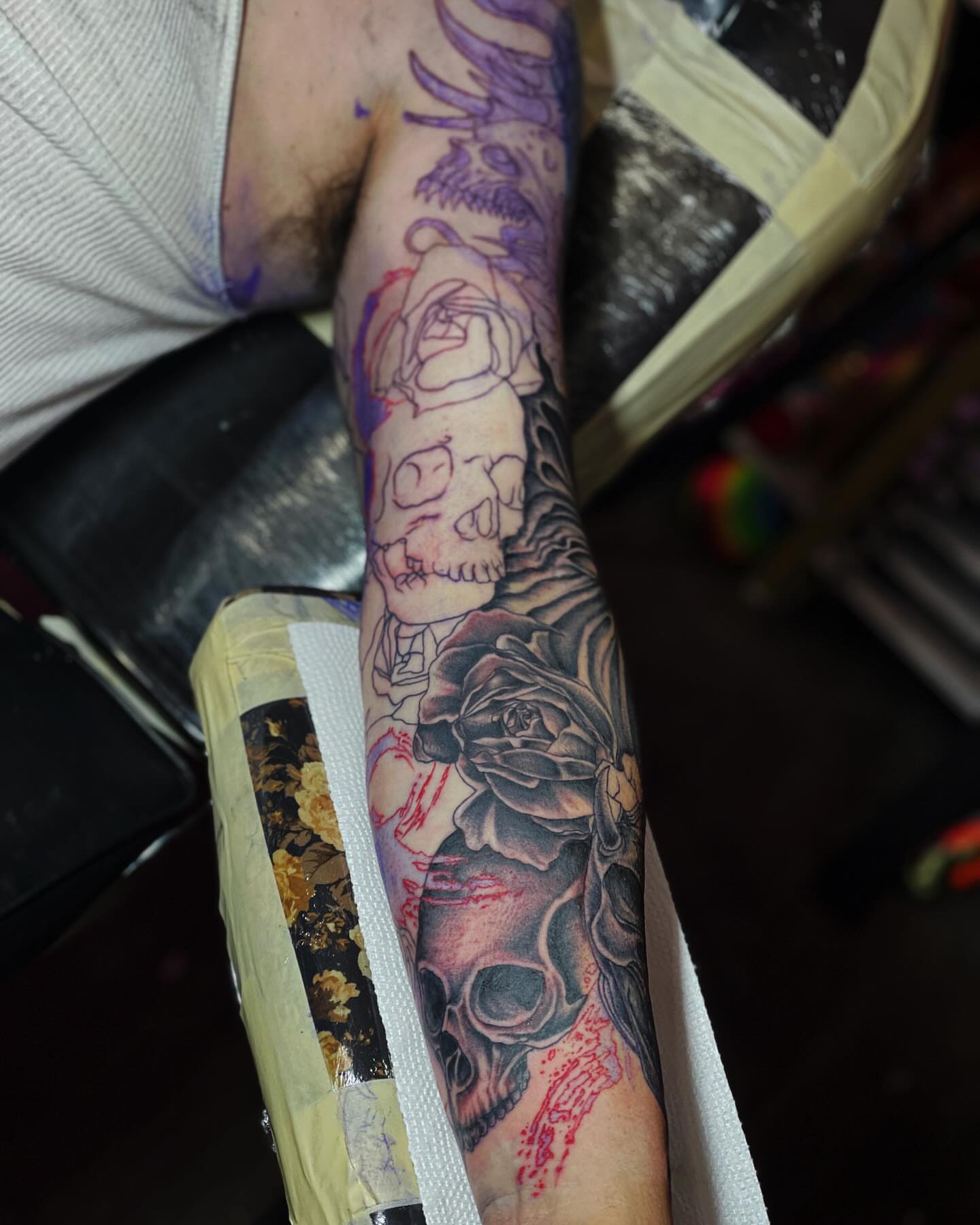 Skull and roses realism tattoo on the forearm by Jamie Jane Voryer