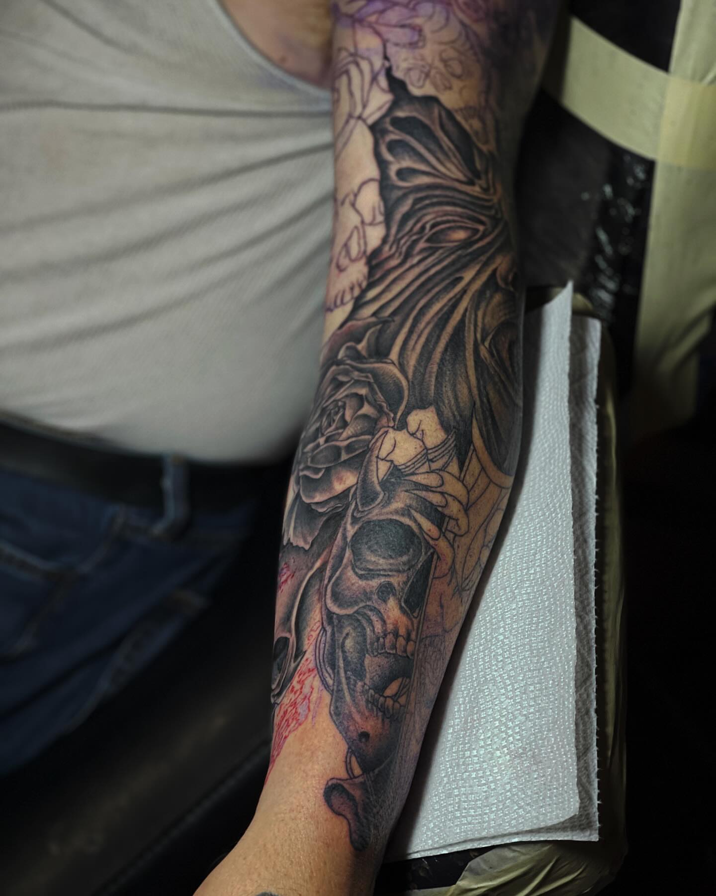Skull and rose realism tattoo on the forearm by Jamie Jane Voryer
