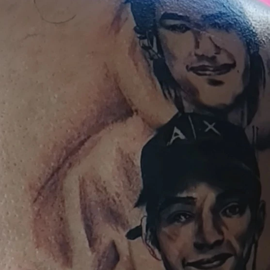 Portrait realism tattoo on the torso by Alfredo Sosa