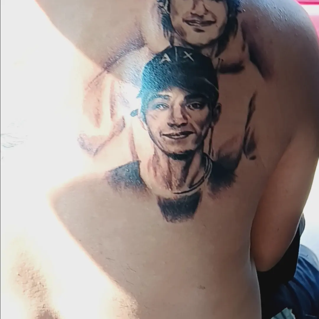 Portrait realism tattoo on the chest by Alfredo Sosa