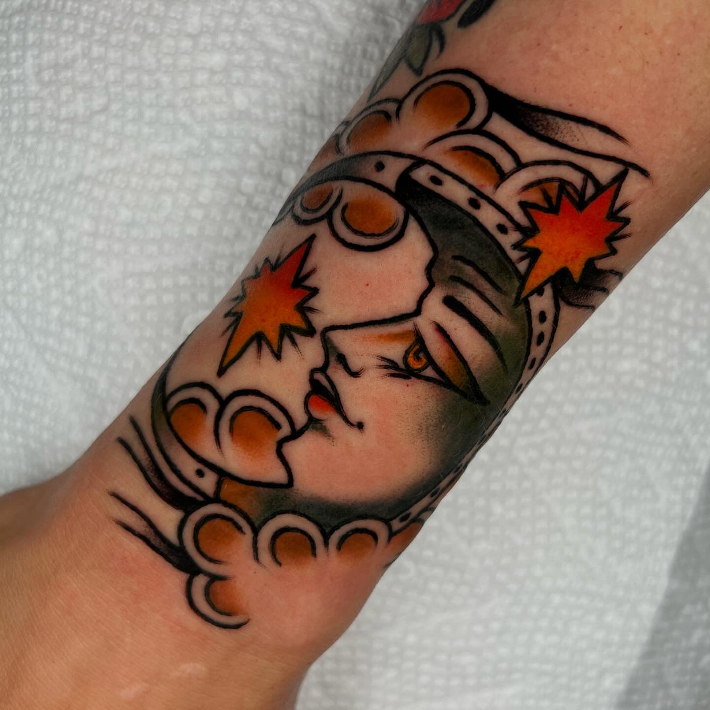 Woman's face American traditional tattoo on the forearm by Hailey Johnson
