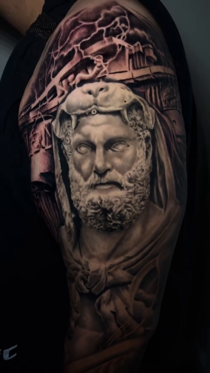Tattoo by @mrgrouchtattoos — realism, black_and_grey