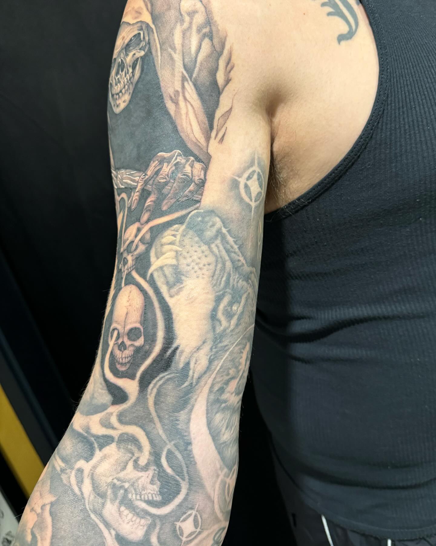 Tattoo by @rtist_ink — black_and_grey, dark_realism