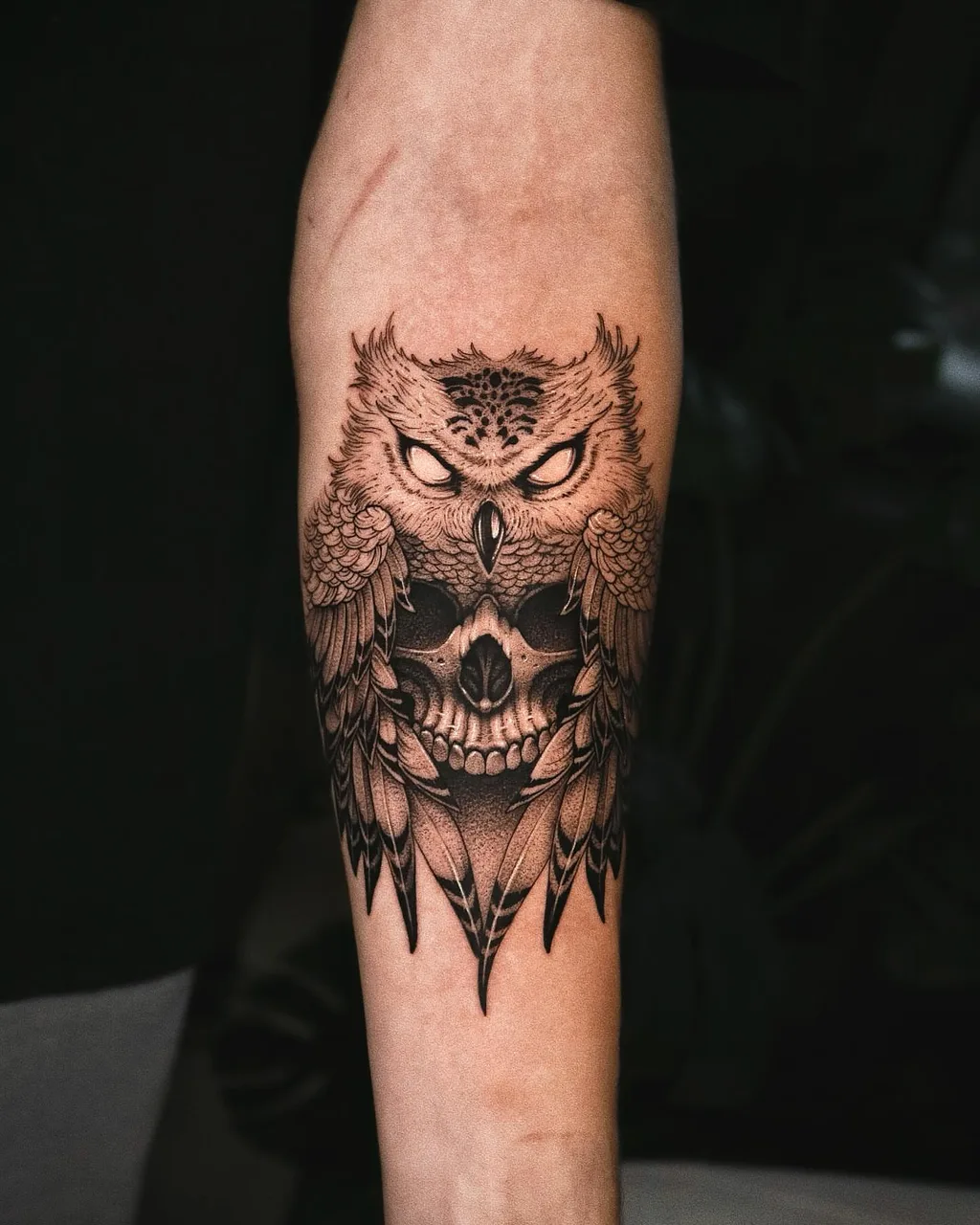 Owl and skull realism tattoo on the forearm by Minho