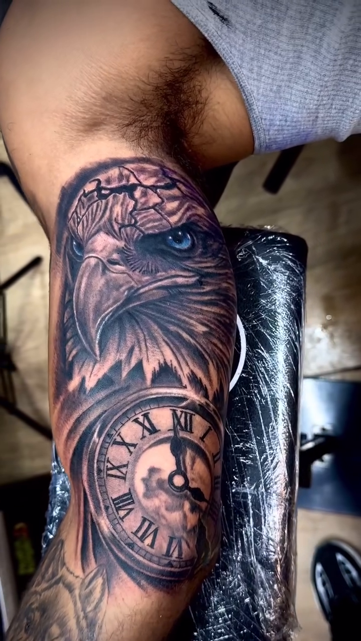 Eagle and clock realism tattoo by Philly Tattoo Artist Drew