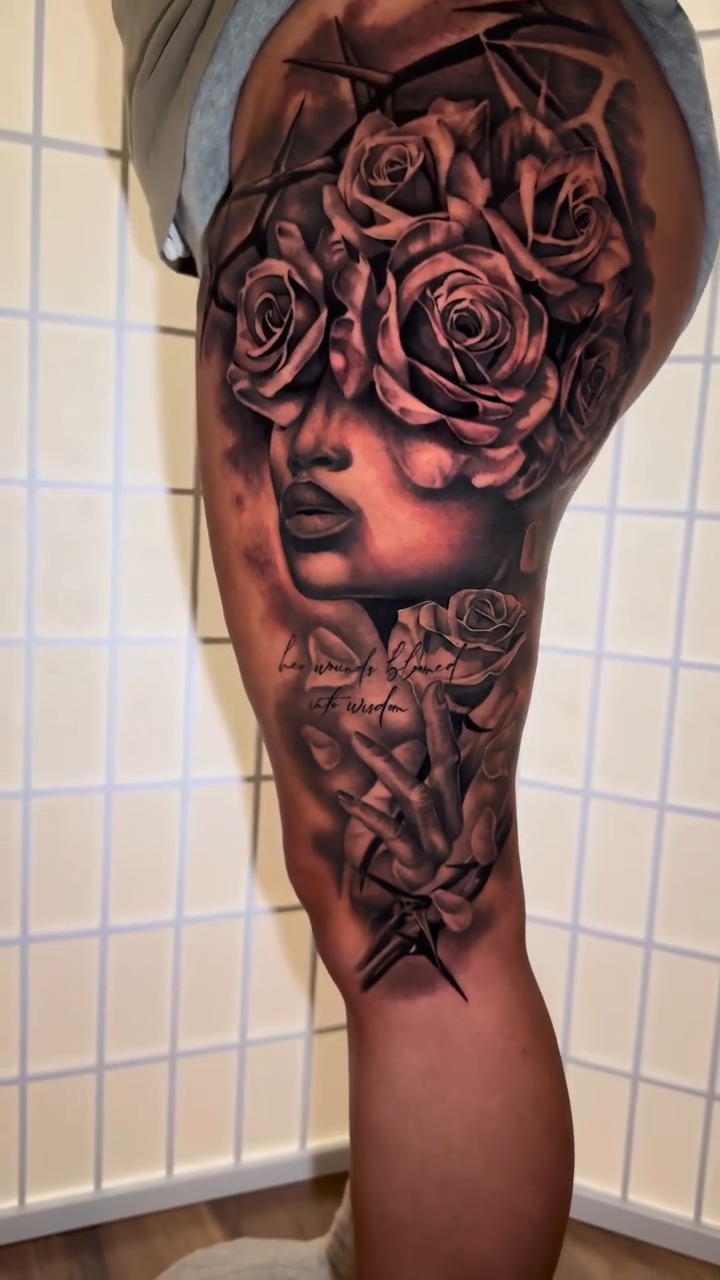 Woman with roses realism tattoo by Flamure Islami