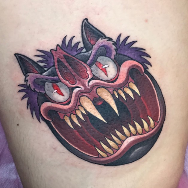 Demon American traditional tattoo on the thigh by Rick Rayne