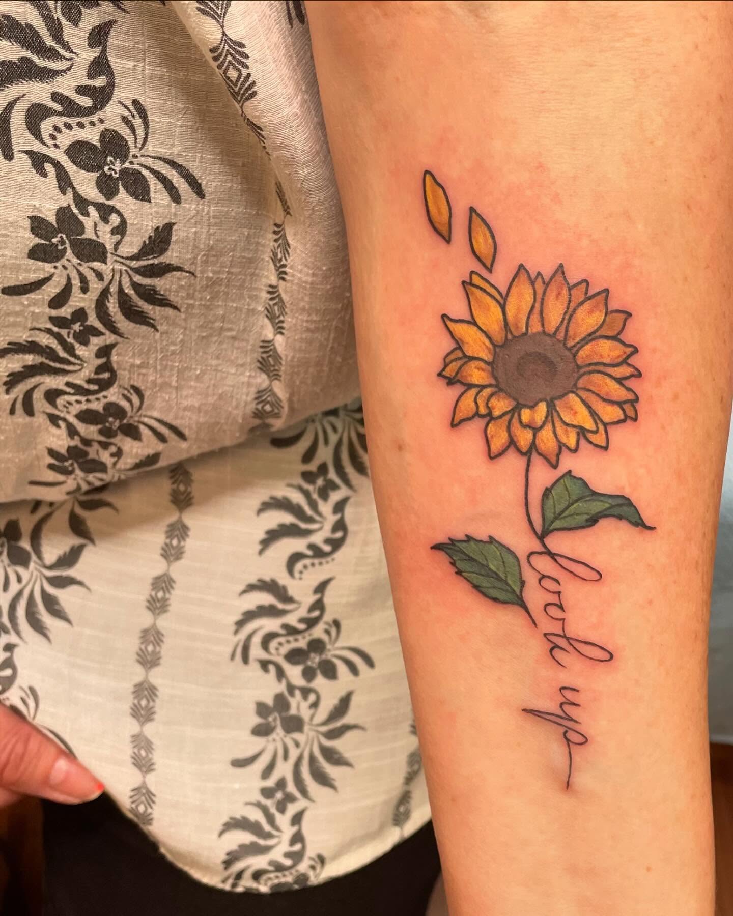 Sunflower dotwork tattoo on the forearm by Anna sabrowsky