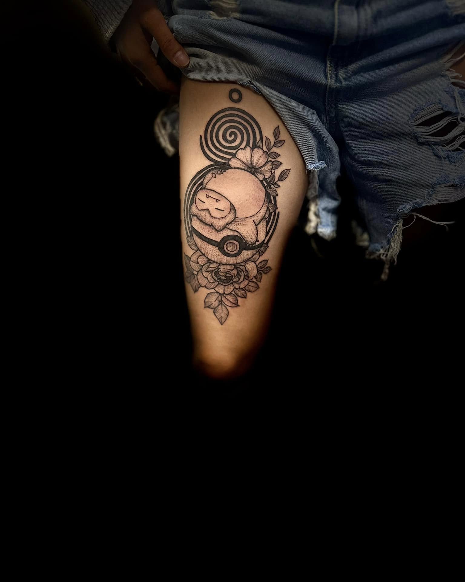 Pig with pokeball black and grey tattoo on the thigh by Aj Negrete Jr.