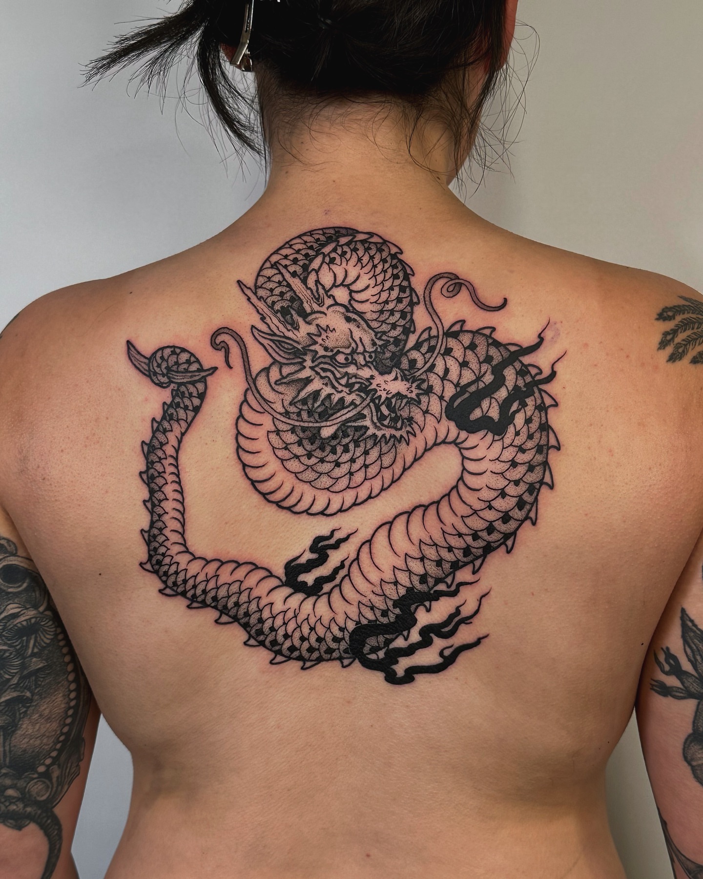 Dragon black and grey tattoo on the back by abigail 🌸