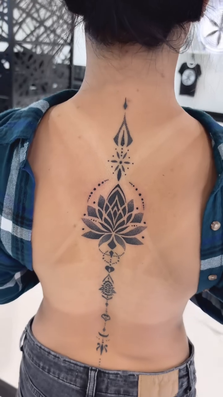 Lotus flower with geometric accents geometric tattoo by ⓝⓐⓘⓡⓐⓓⓞⓣⓢ
