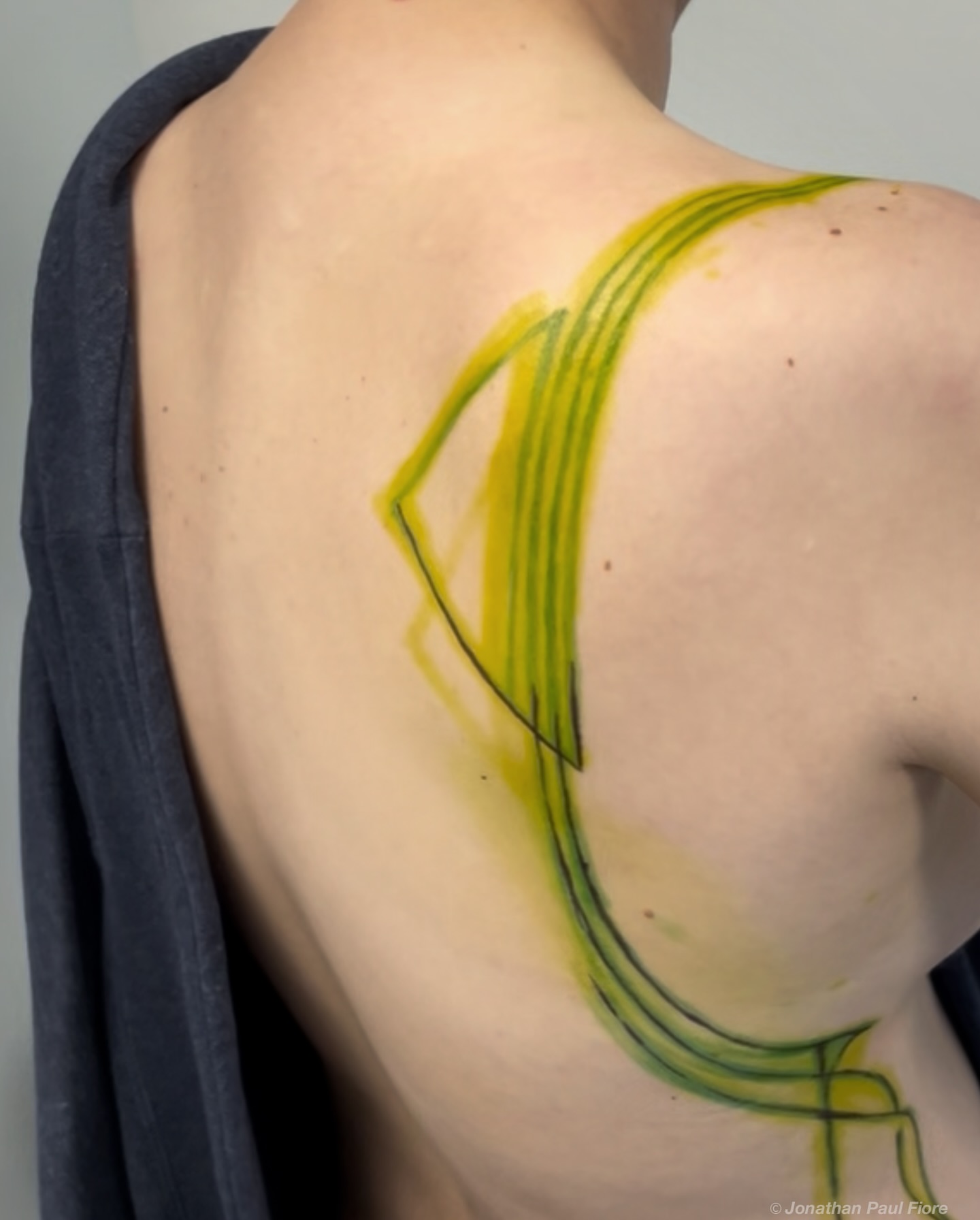 Abstract lines geometric tattoo on the back by Jonathan Paul Fiore, Austin, Texas