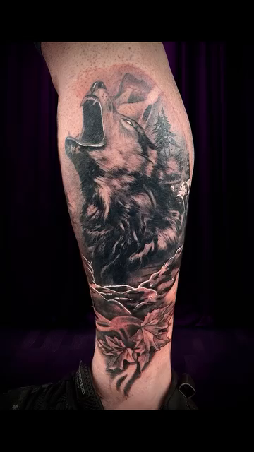 Wolf and flowers realism tattoo by Nick Harrison, Dayton, Ohio