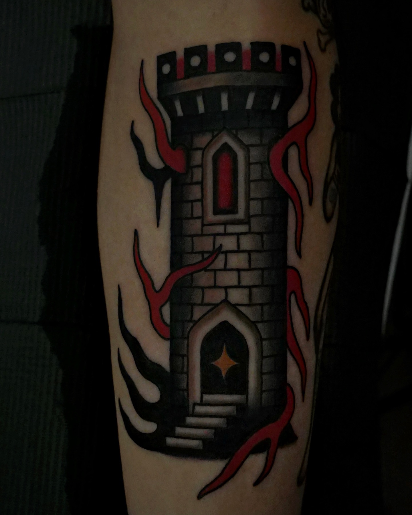 Castle tower American traditional tattoo on the forearm by Brandon Murphy