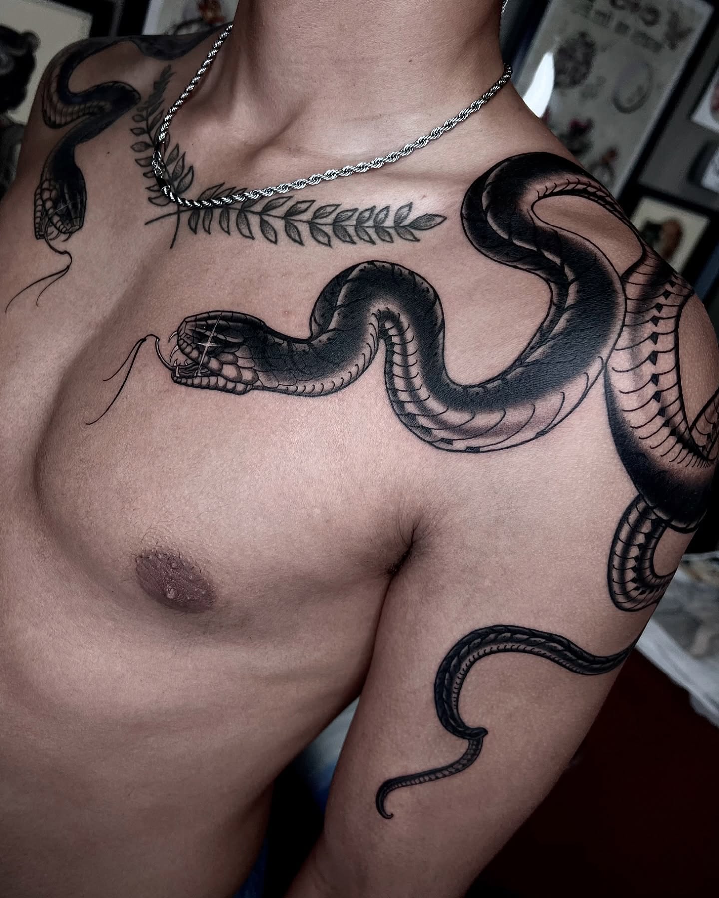Snake realism tattoo on the chest by Lorenzo Gomez, San Diego, California