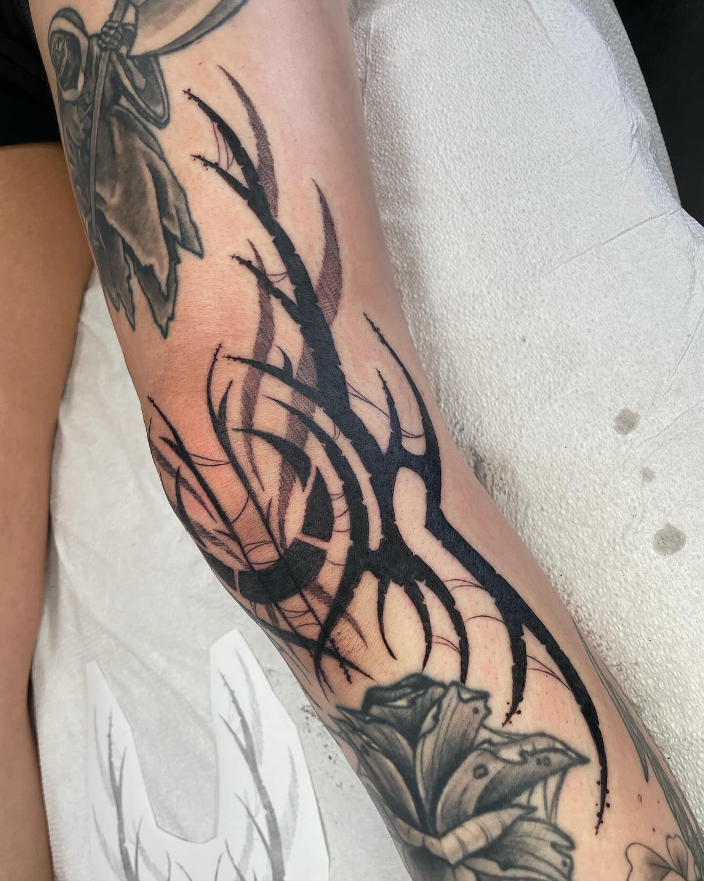 Abstract branches tribal tattoo on the forearm by Kathryn the Tooth Collector