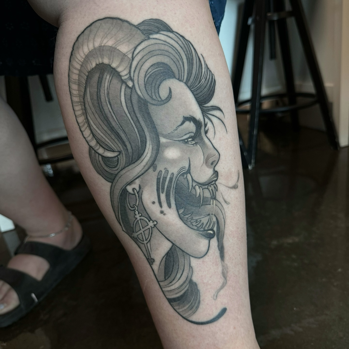 Ram head black and grey tattoo on the forearm by Anne Cornelson