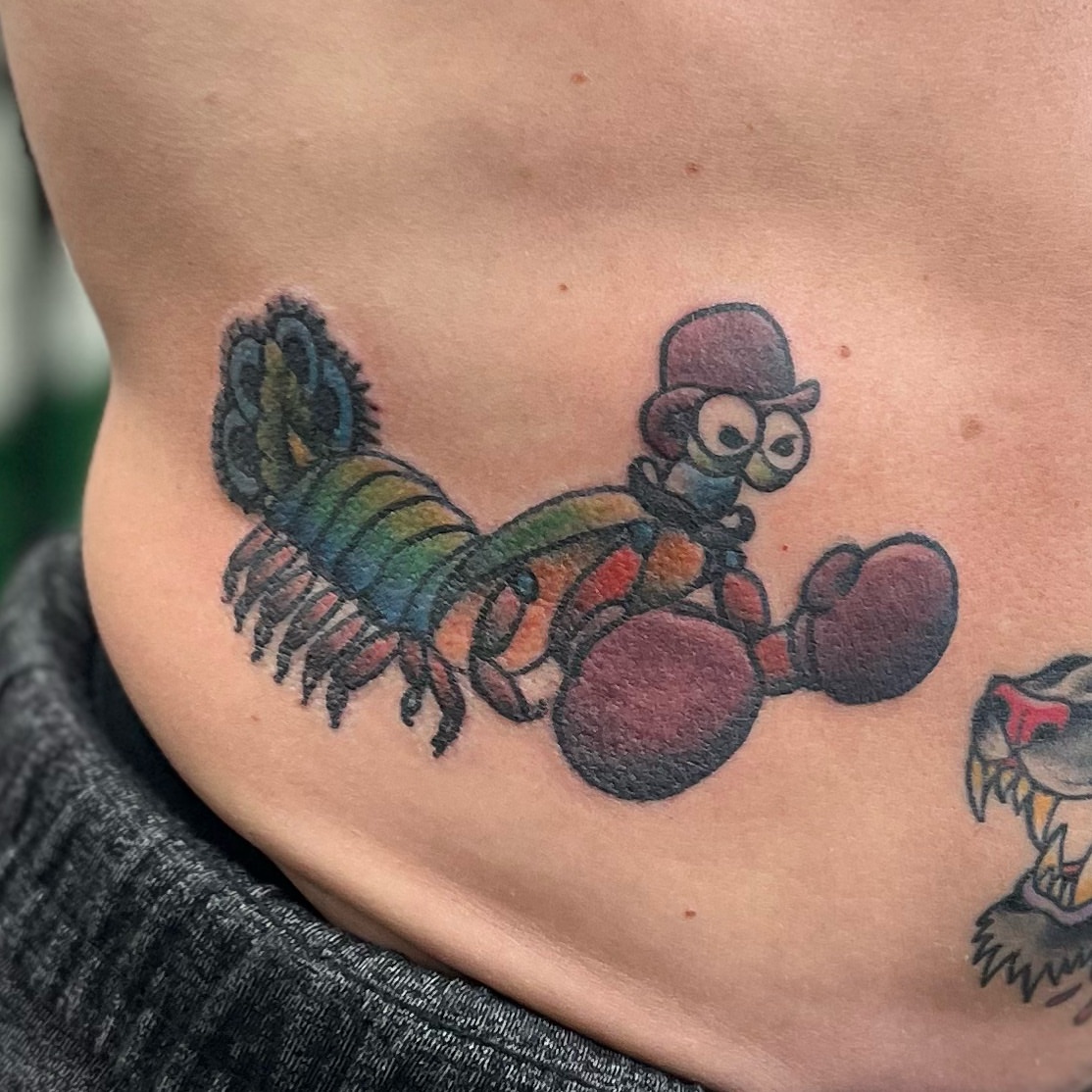 Lobster American traditional tattoo on the torso by Ashley Camp