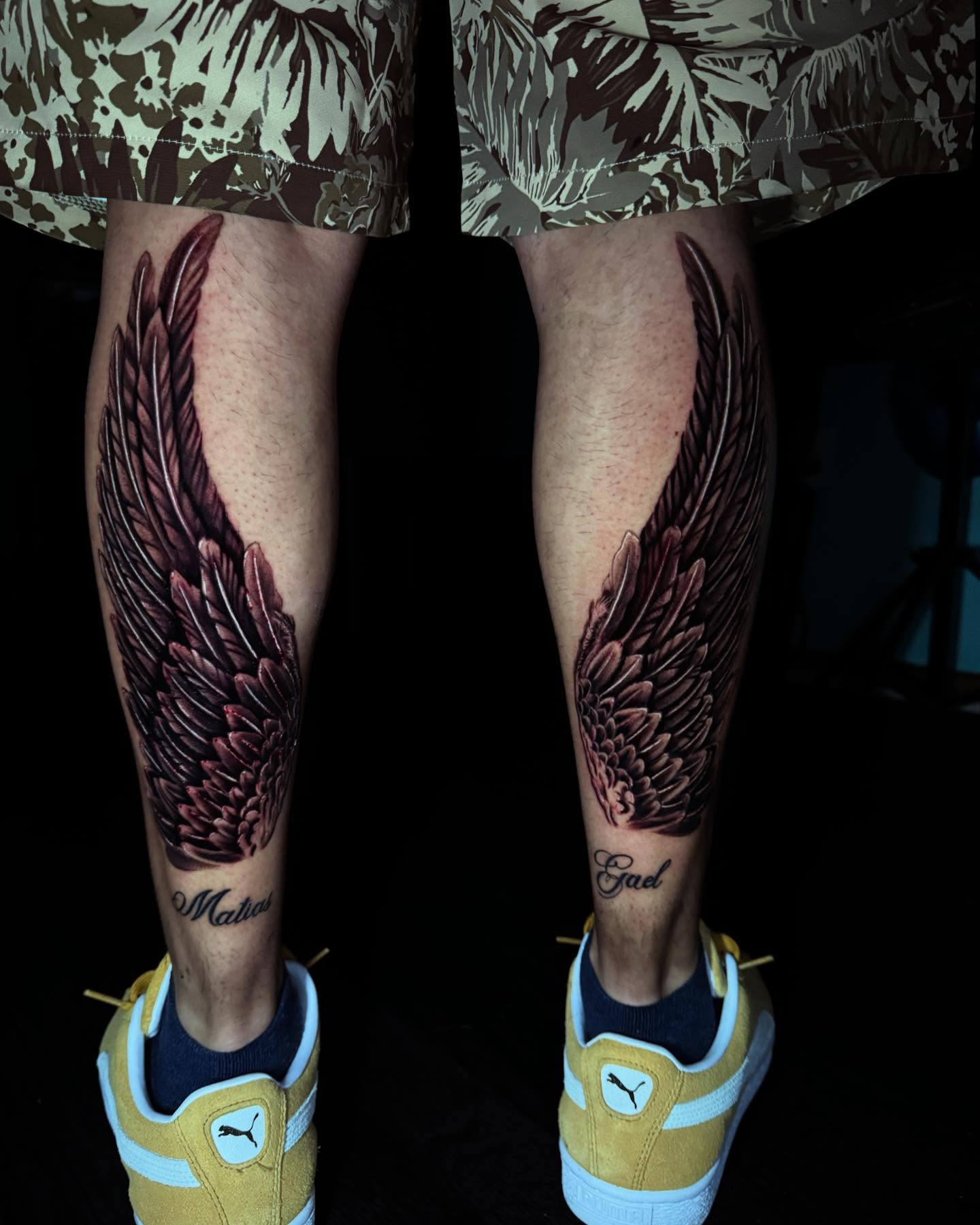 Wings realism tattoo on the calf by Alberto Ramirez