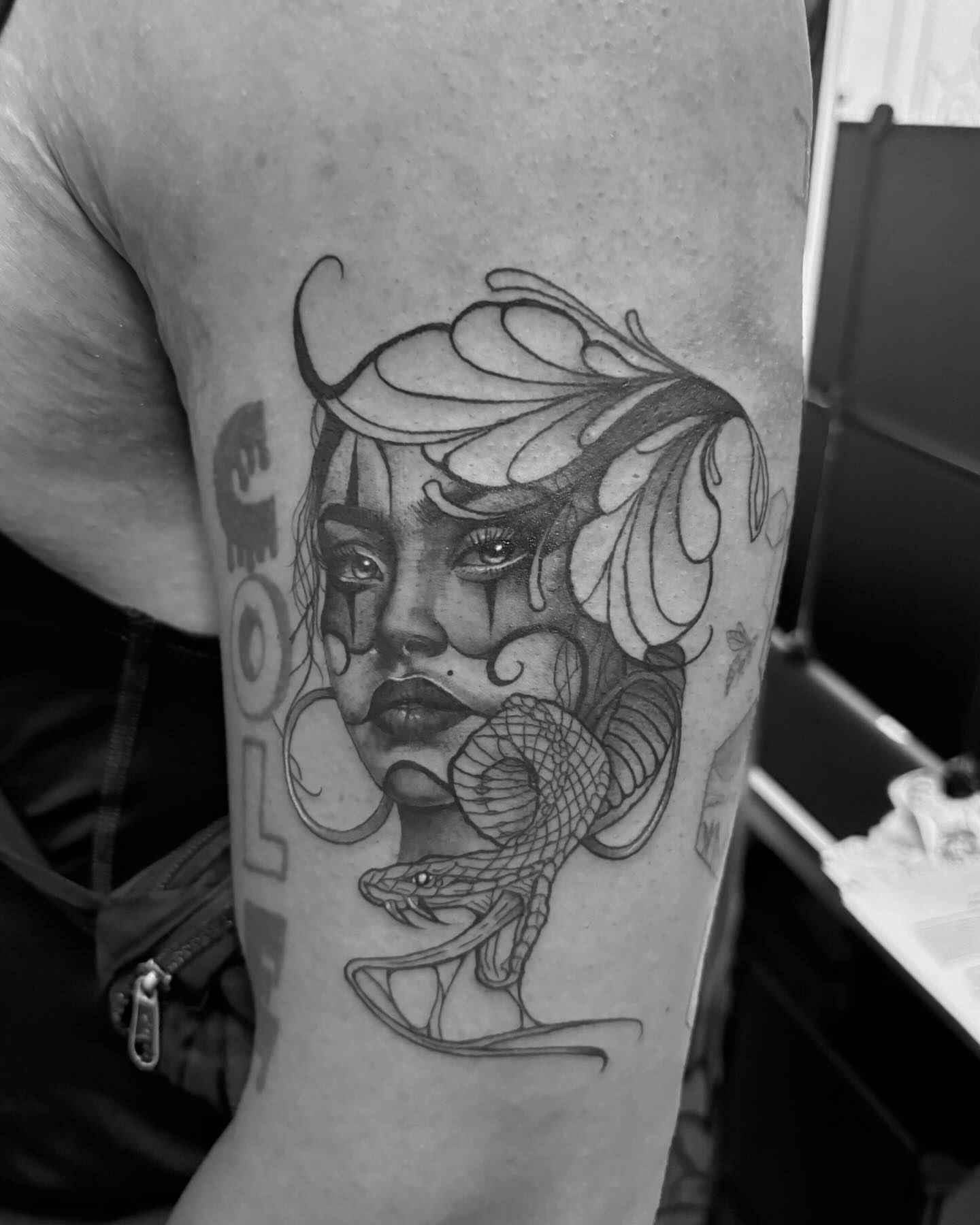 Woman with snake realism tattoo on the forearm by orlando