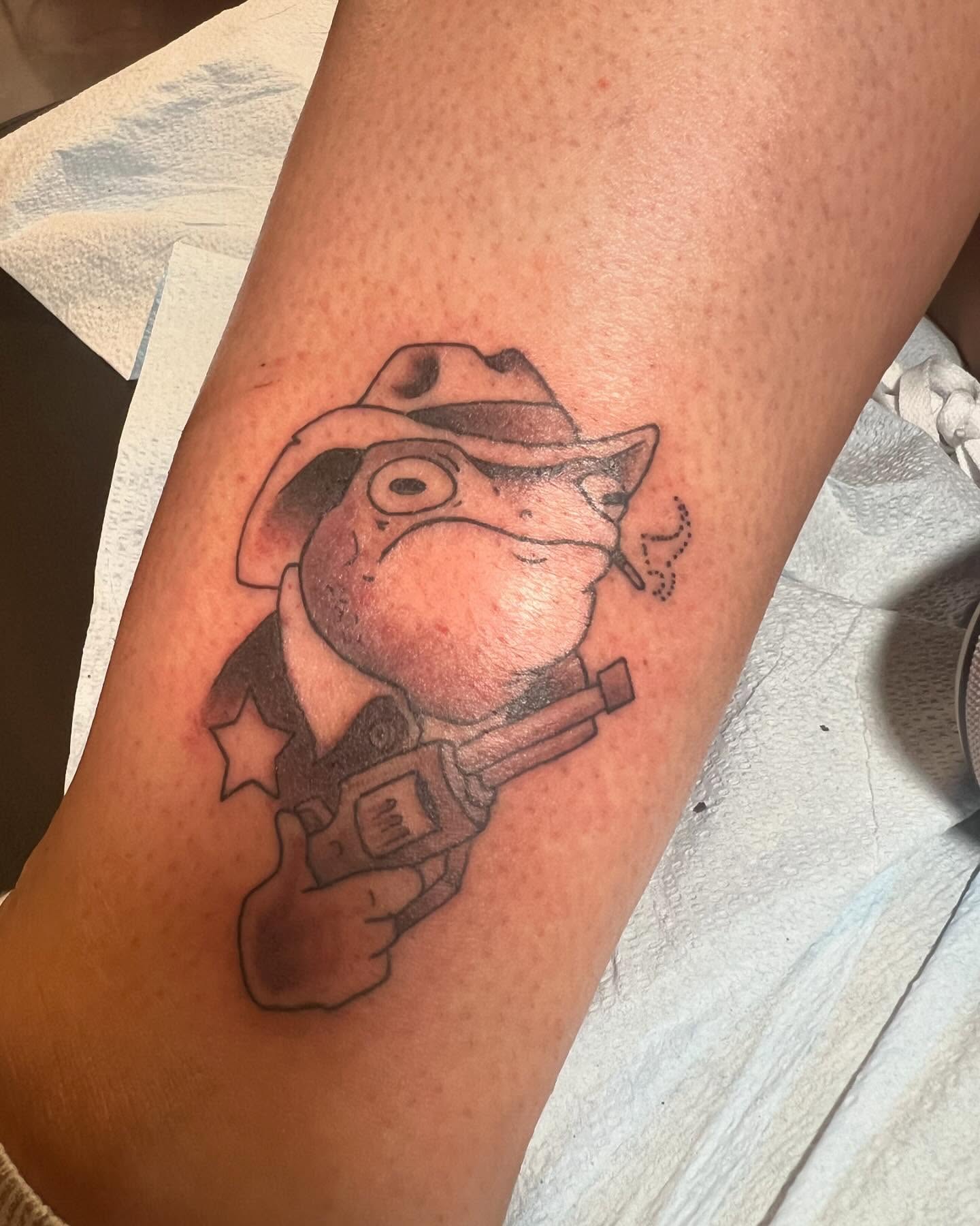 Cowboy pig black and grey tattoo on the forearm by Cody Marl