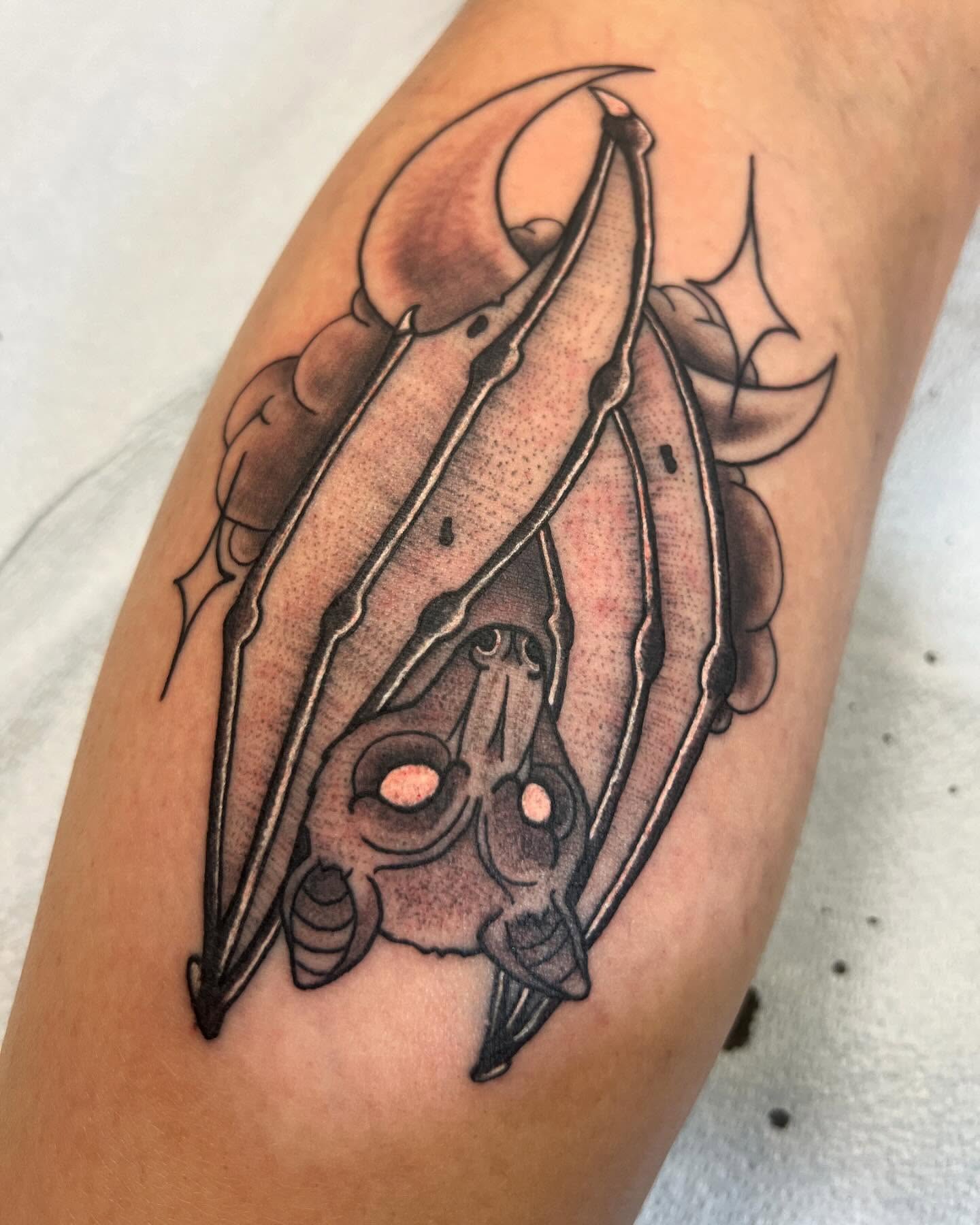 Bat black and grey tattoo on the forearm by Cody Marl