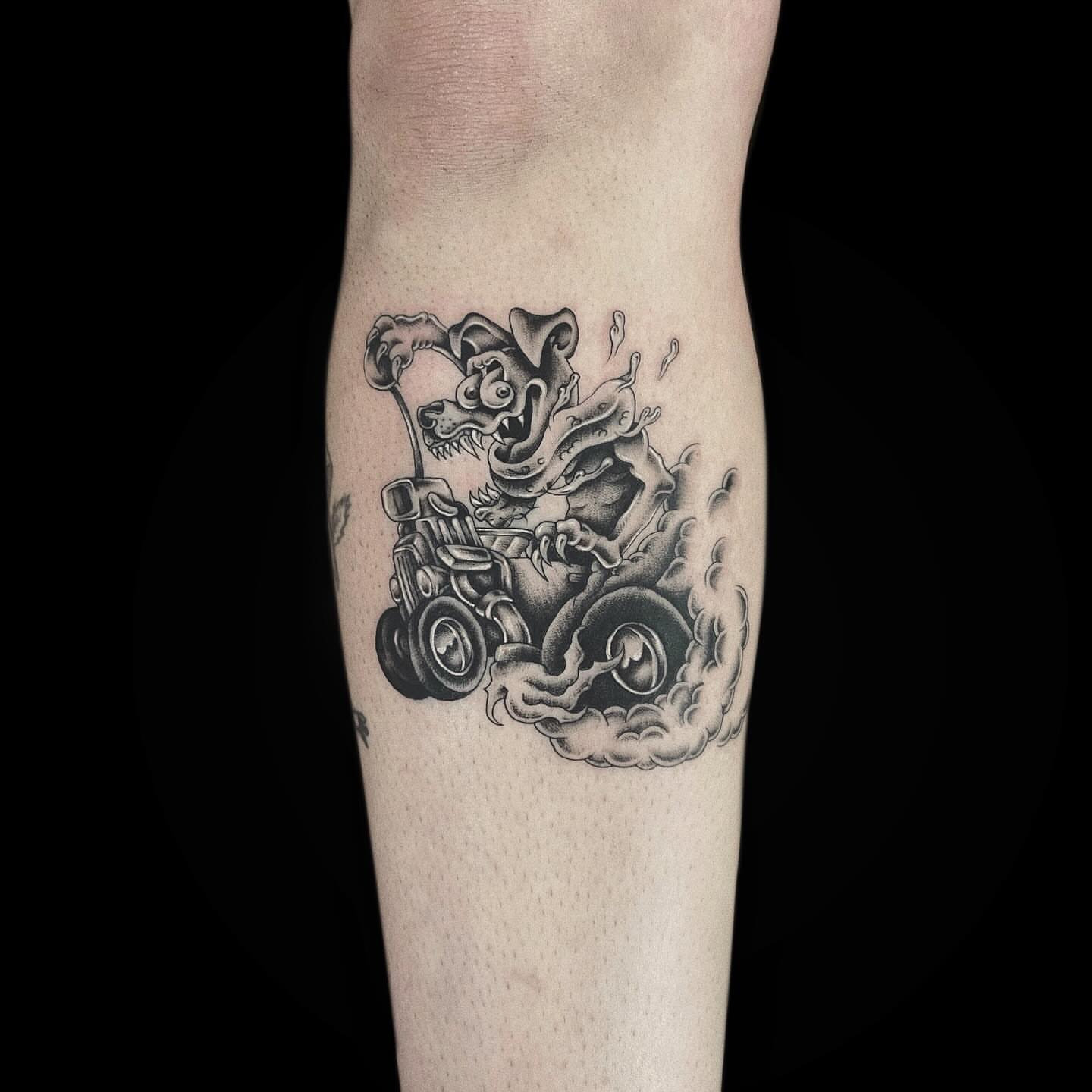 Monster driving car realism tattoo on the forearm by Jason
