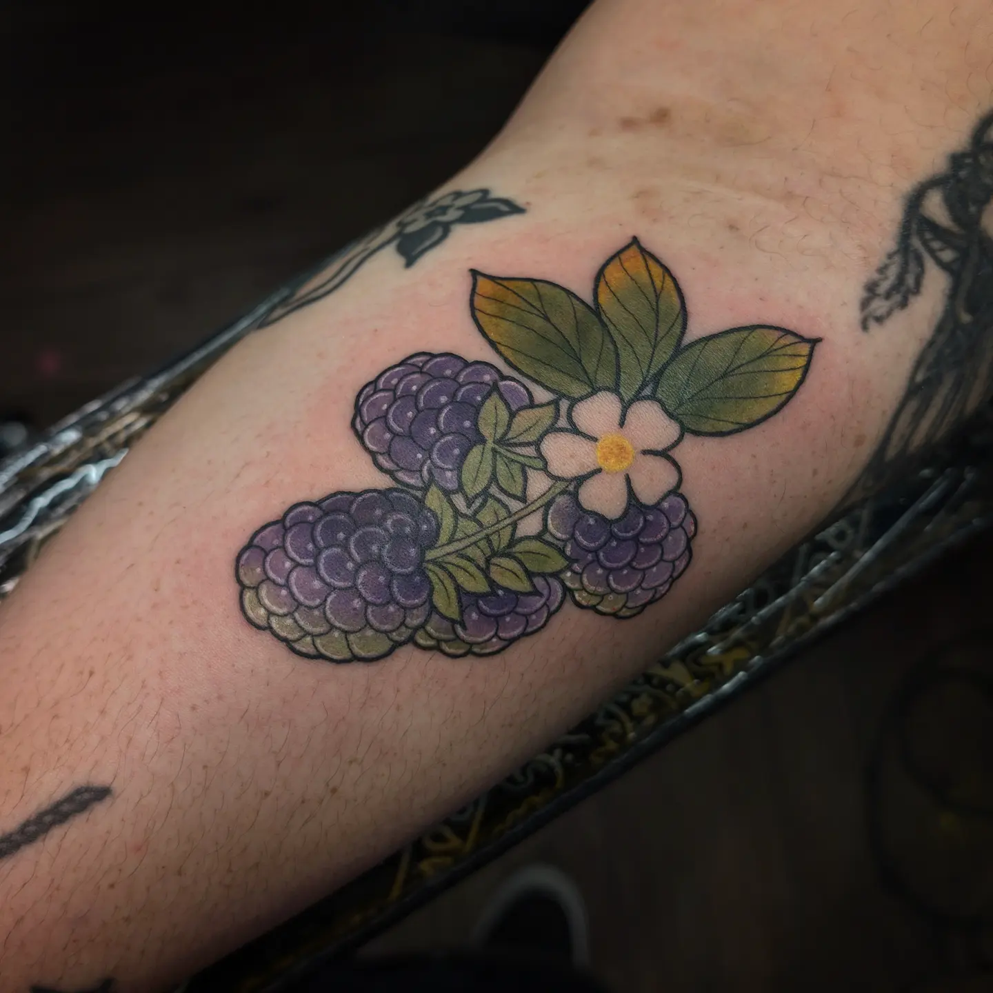 Blackberries and flower American traditional tattoo on the forearm by 𝑹𝒆𝒚𝒎𝒂𝒓𝒄 𝑫𝒂𝒚𝒂𝒖𝒐𝒏